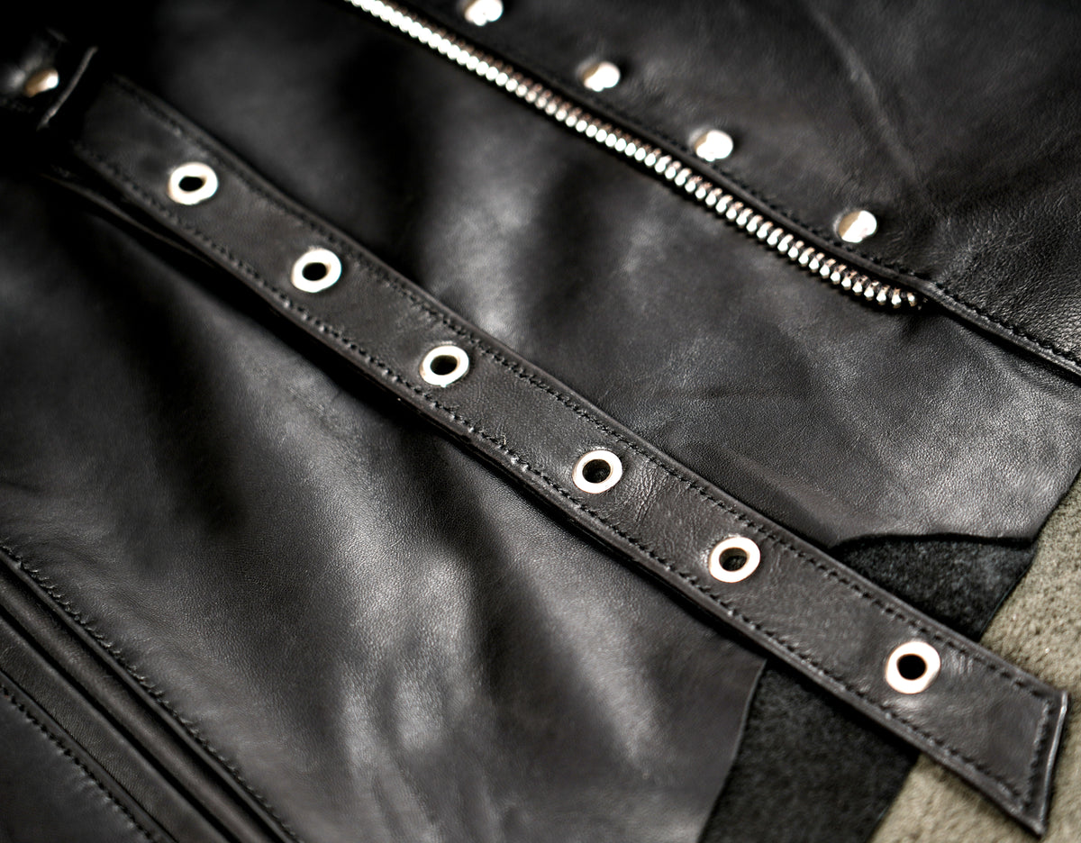 Black leather biker skirt with studs and zipper detailing