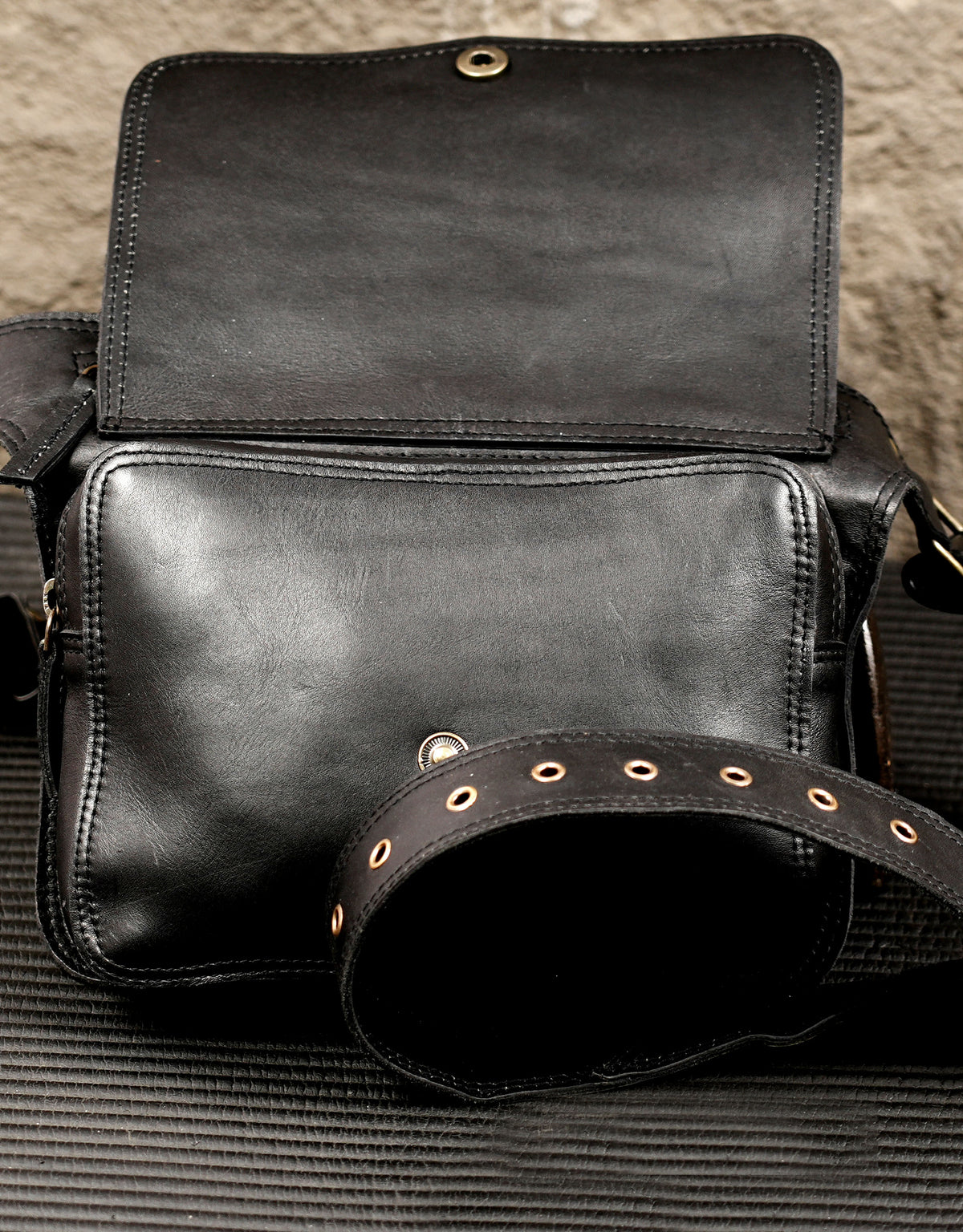 Black leather crossbody hip bag with two-pocket design