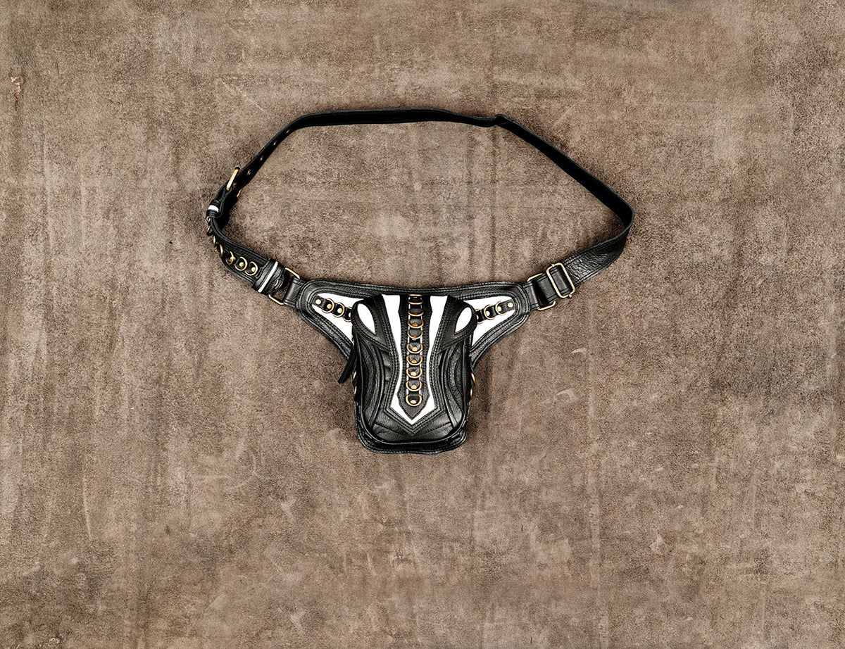 Black leather waist bag with layered panels and ring accents