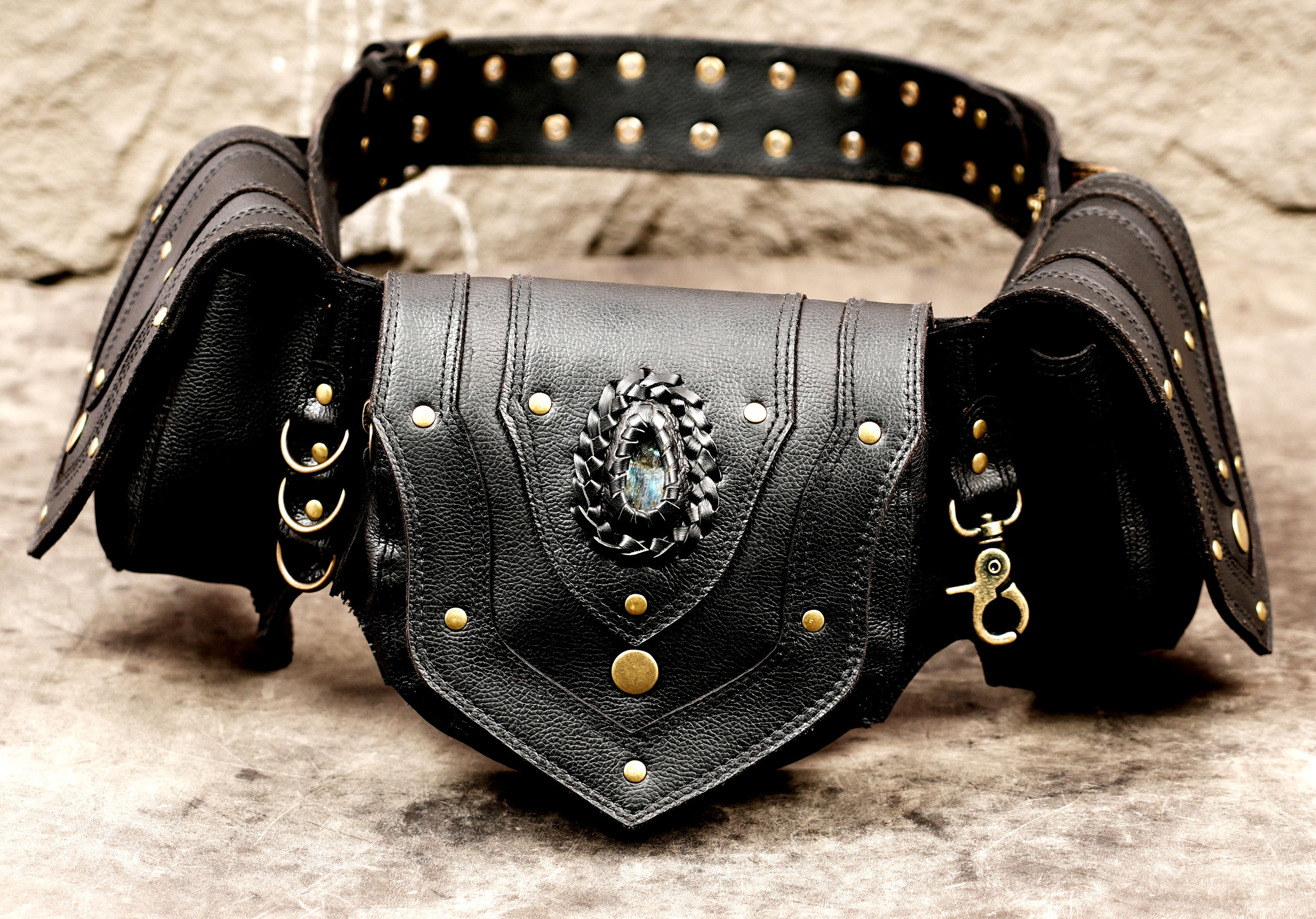 Black leather hip bag with secure storage pockets