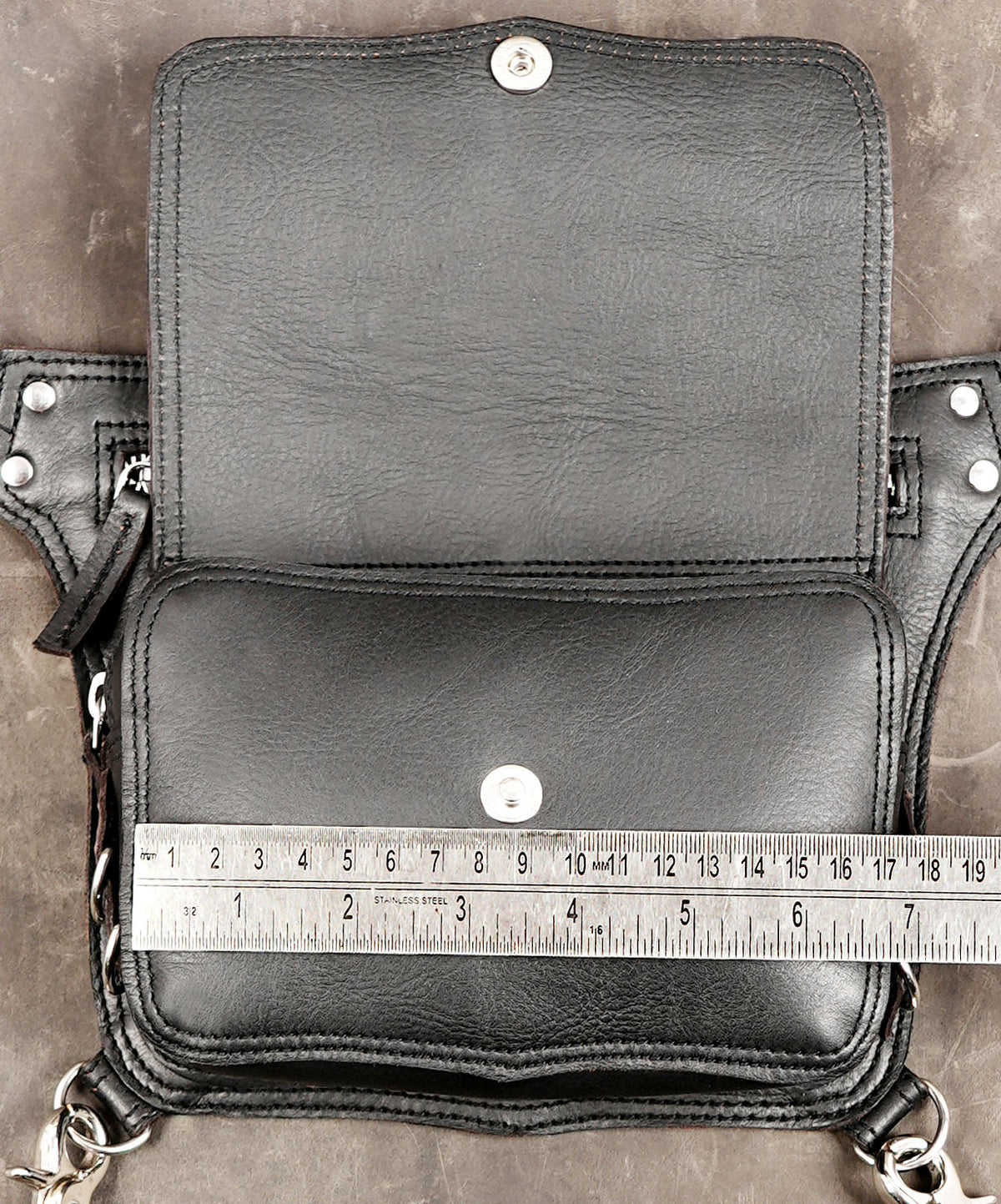 Black leather motorcycle bag with zipper storage pocket
