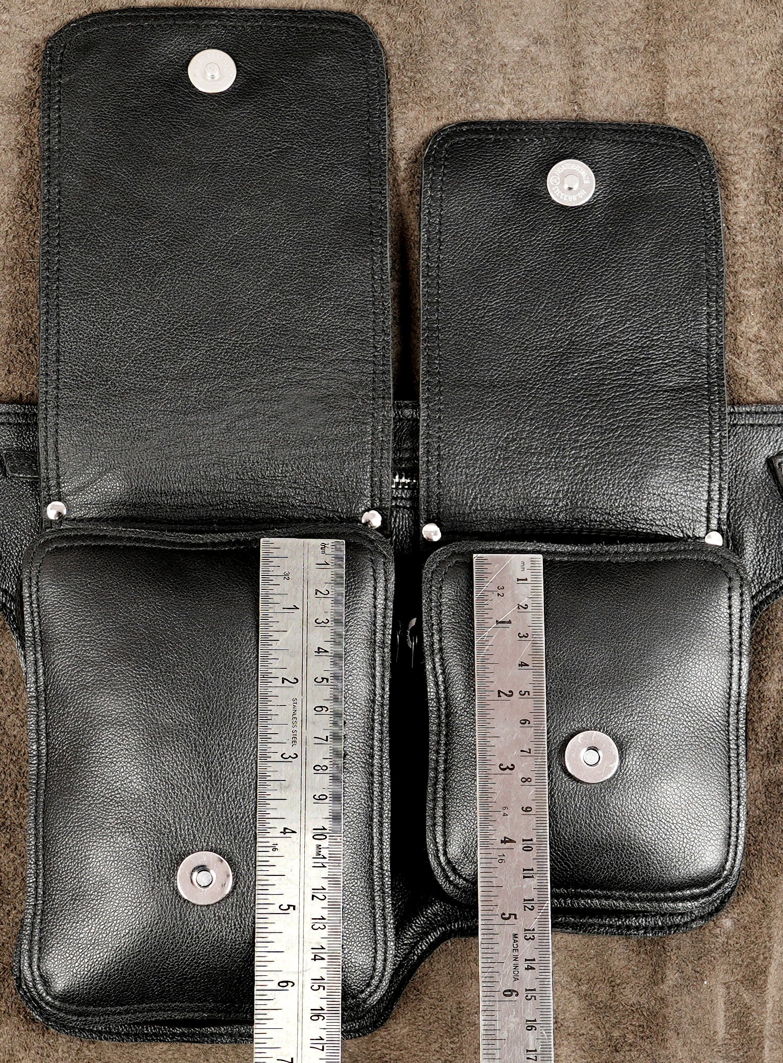 Black leather travel bag with two front compartments