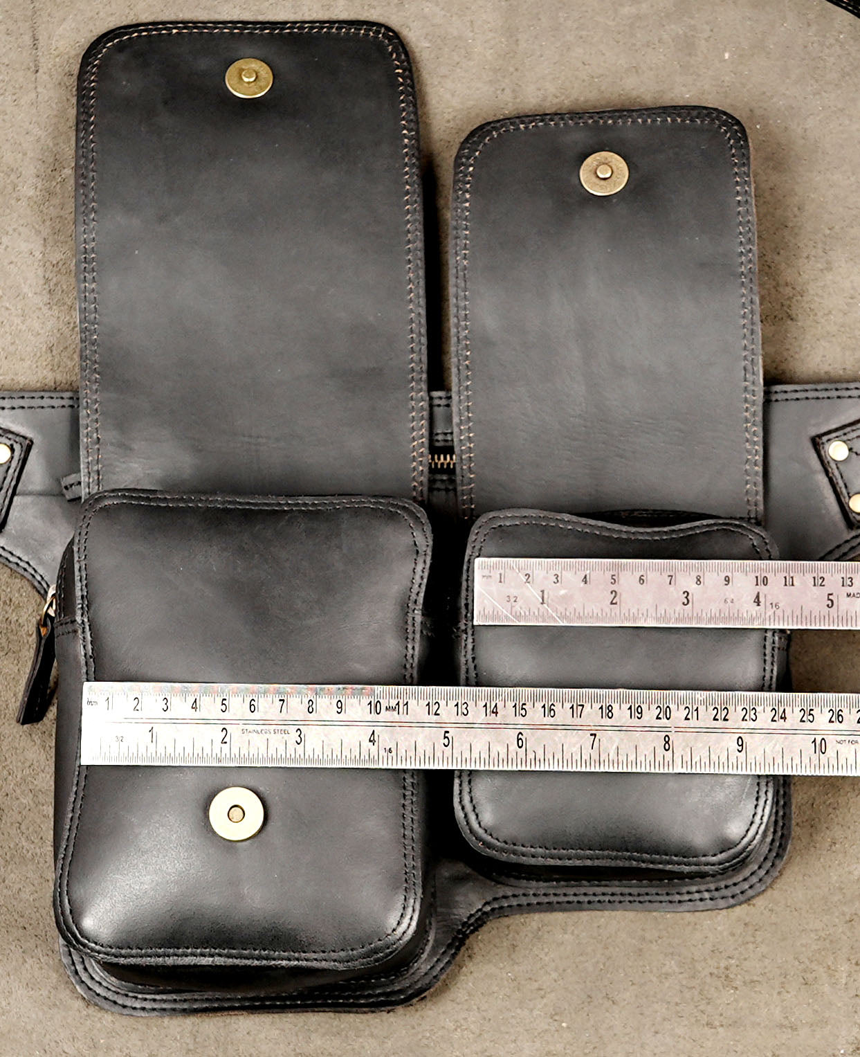 Black leather travel bag with two front compartments