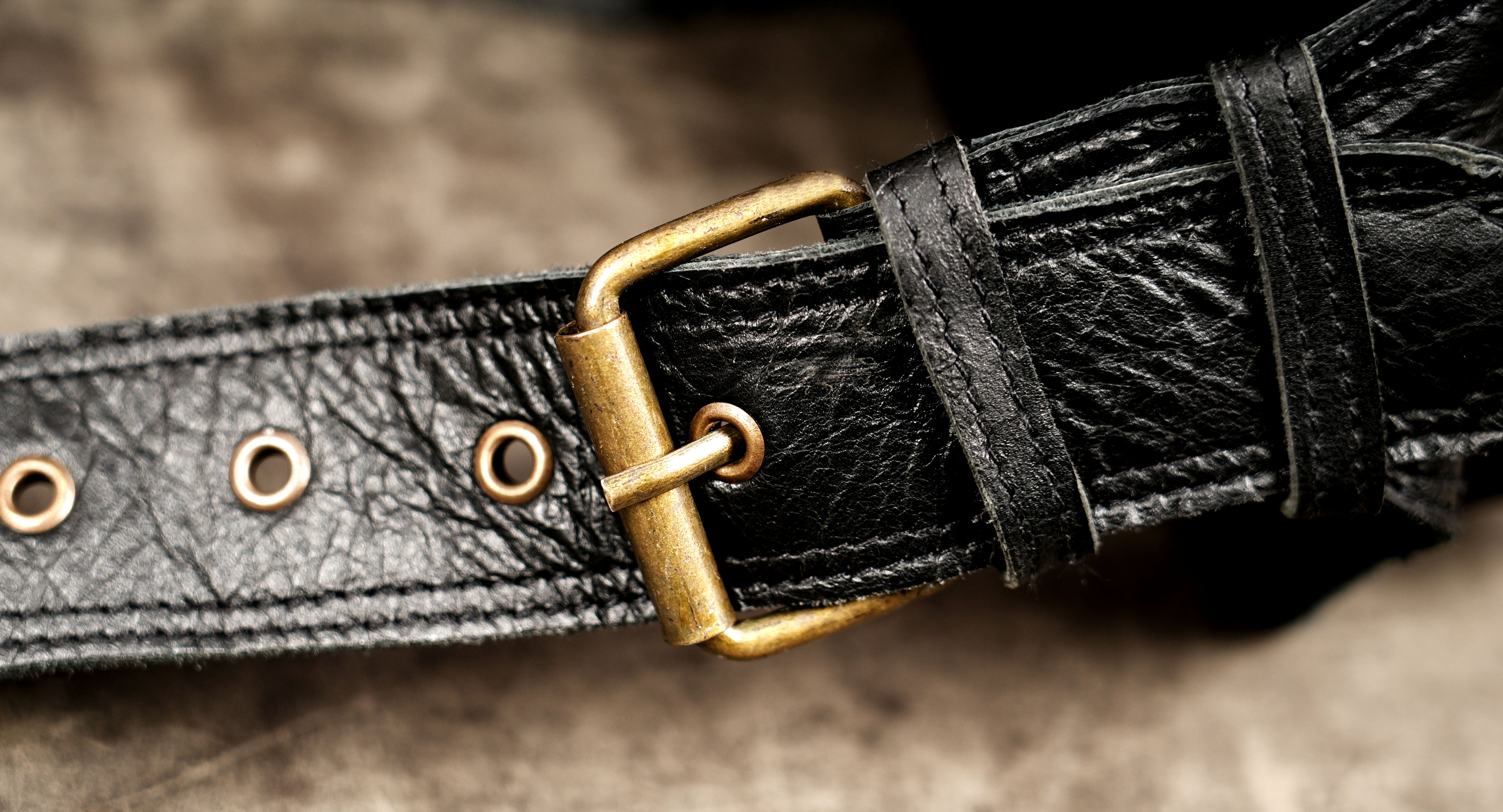 Black leather travel waist pouch with organised storage