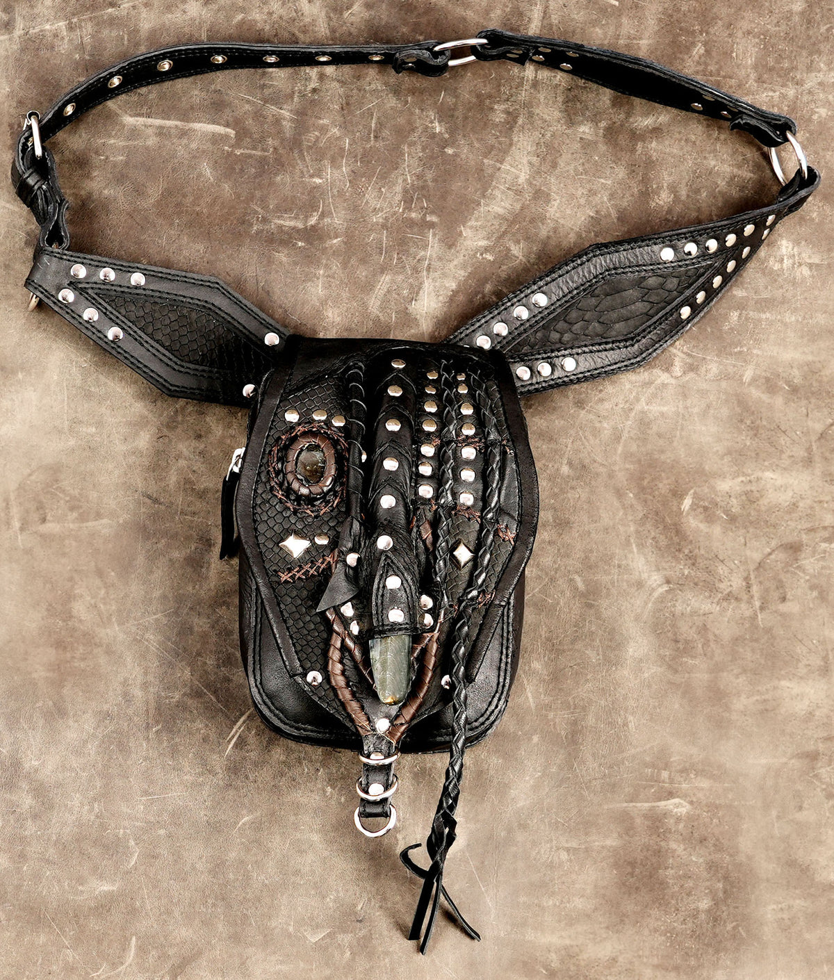 Black leather waist bag with nickel silver fittings and crystal stones