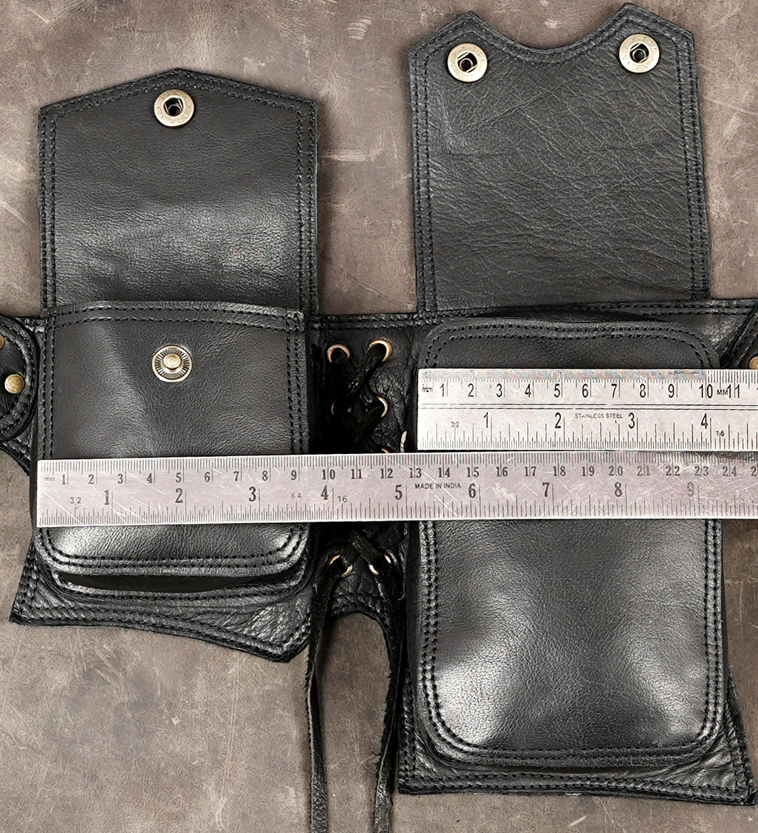 Black leather waist pouch with secure flap closures