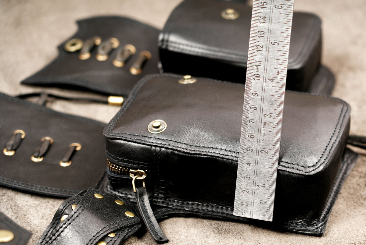 Black leather larp belt with four pouches and buckle closure