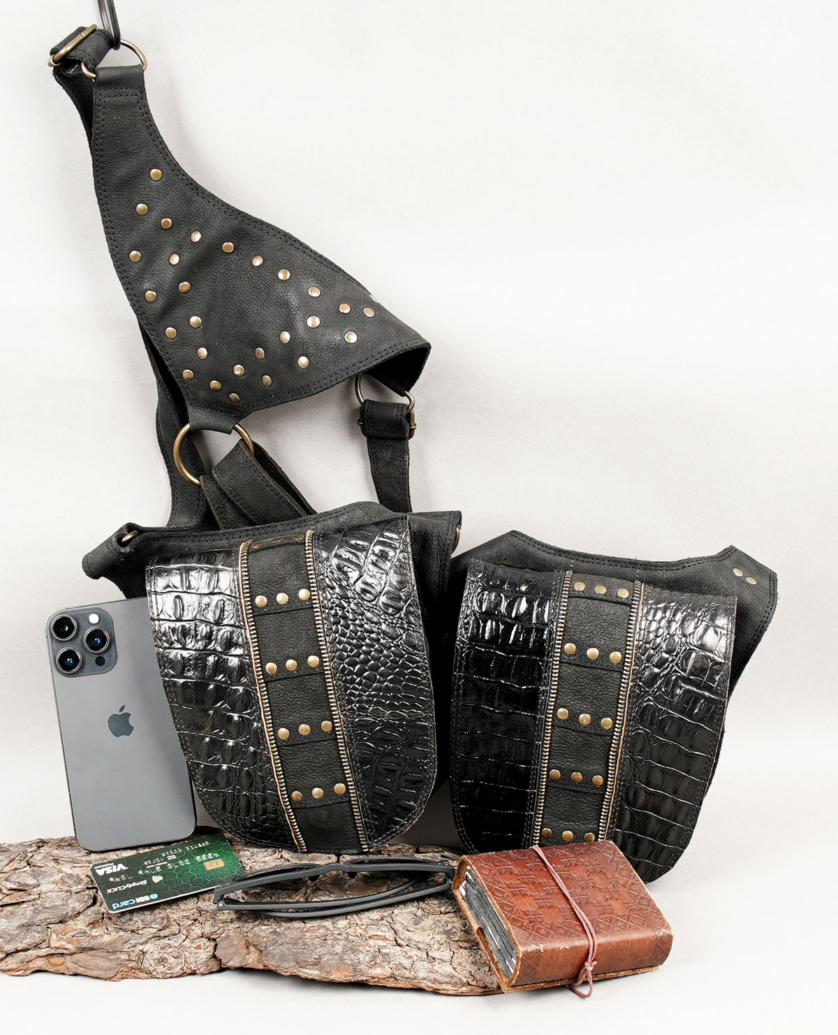 Festival utility belt with two black leather pouches and decorative metal accents