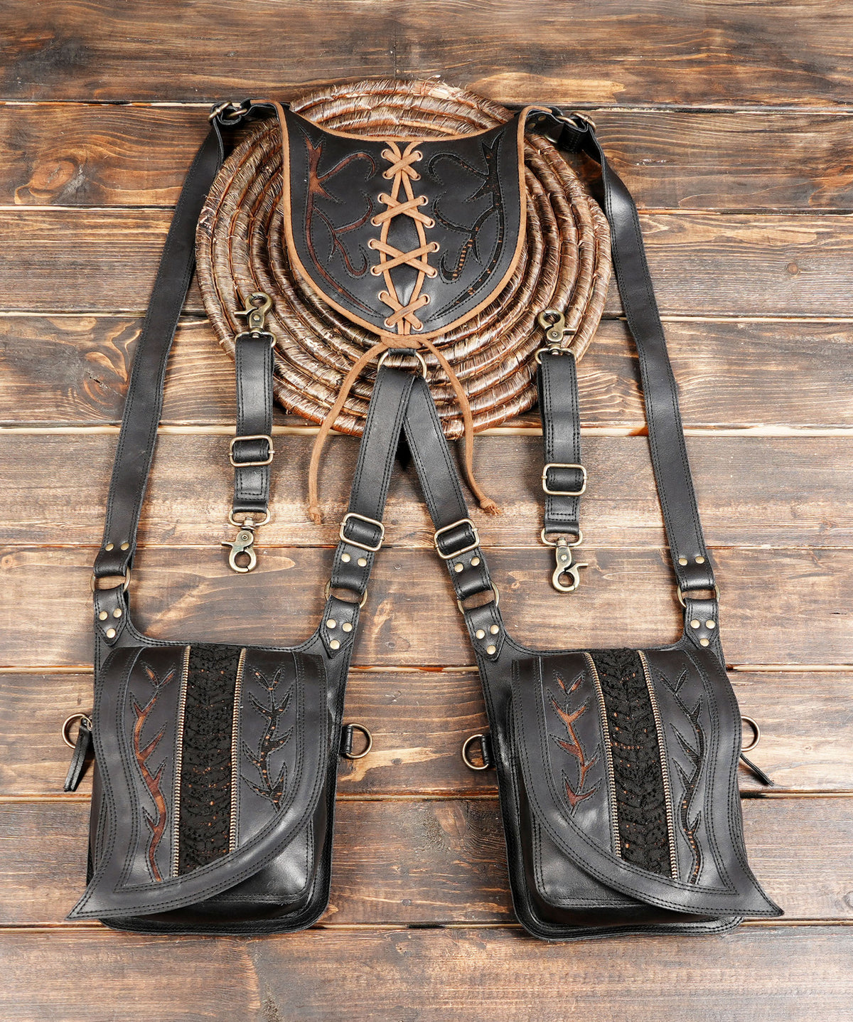 Black leather double shoulder harness bag with two utility pouches