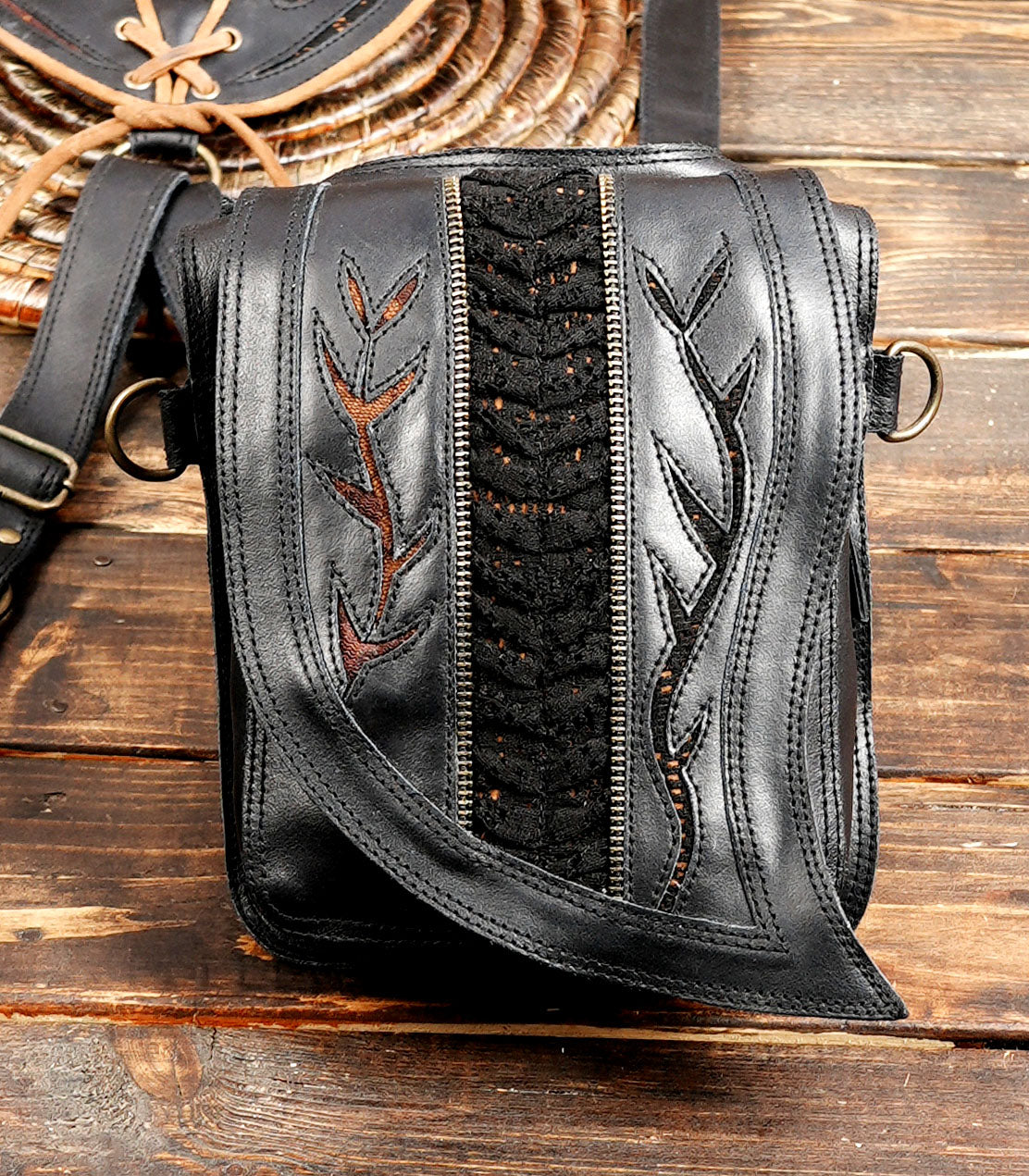 Black leather shoulder harness bag for festival and travel use