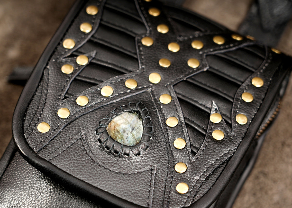 Burning Man festival harness bag with black leather and gemstone decoration