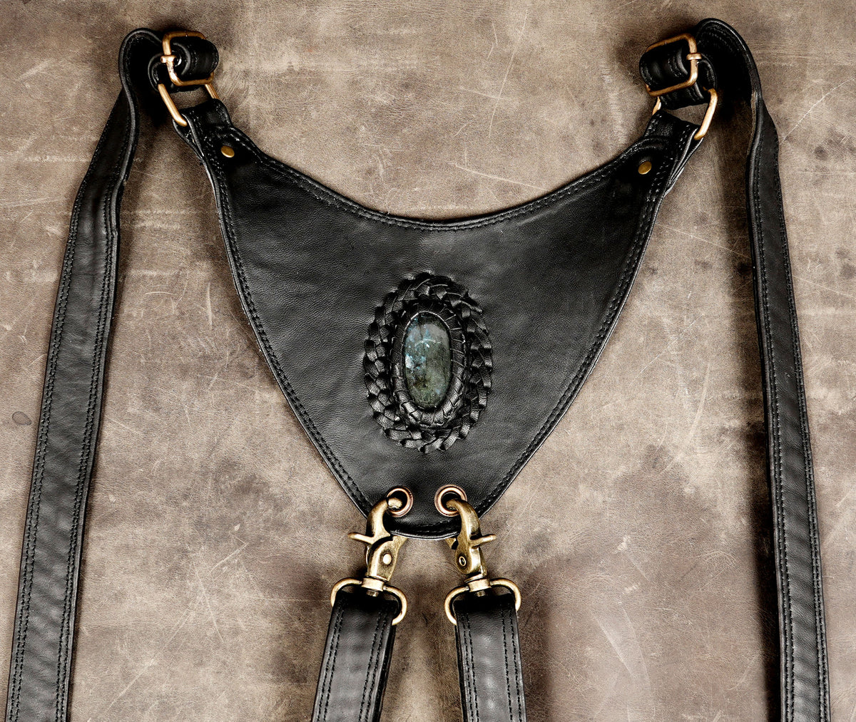 Leather festival harness with two black utility bags and metal hardware