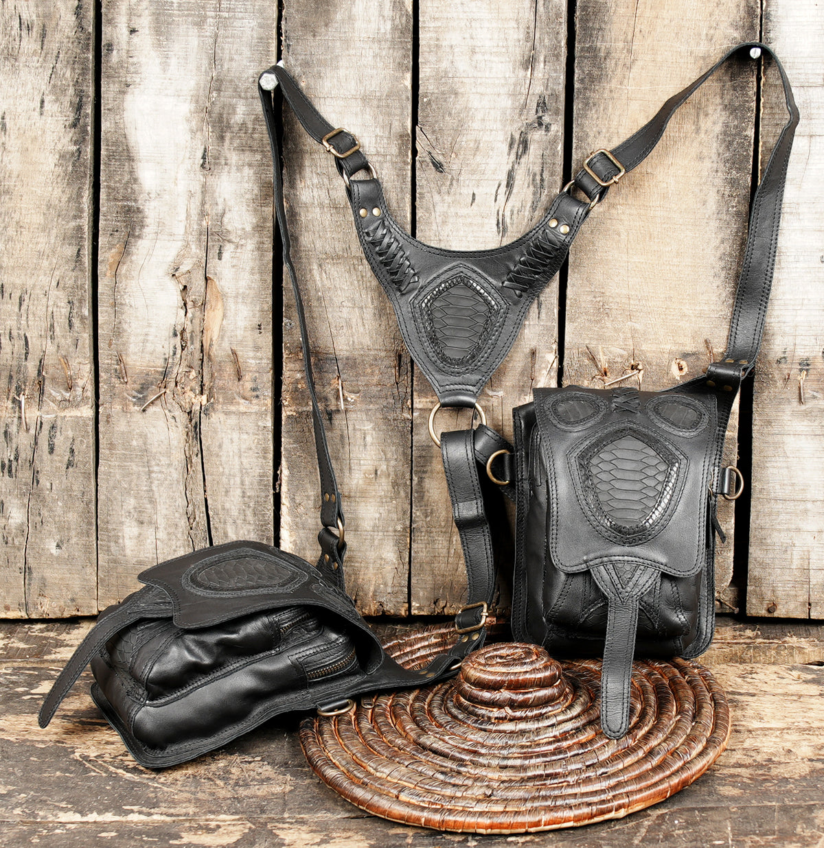 Black leather festival bag with adjustable straps and dual storage compartments