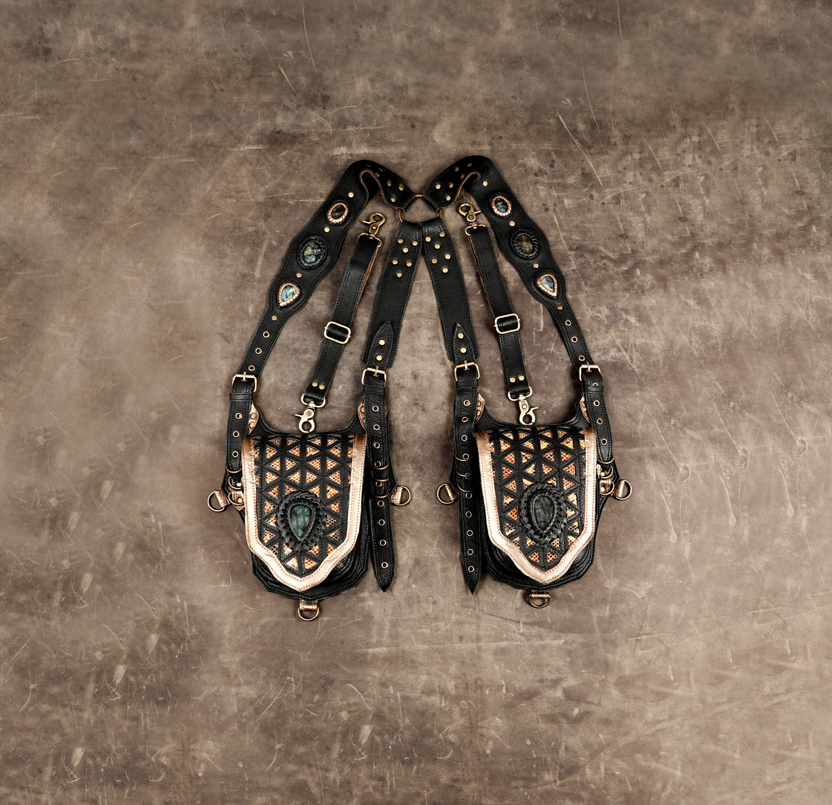 Handmade black leather double pocket harness bag with gemstone details and decorative brass studs.