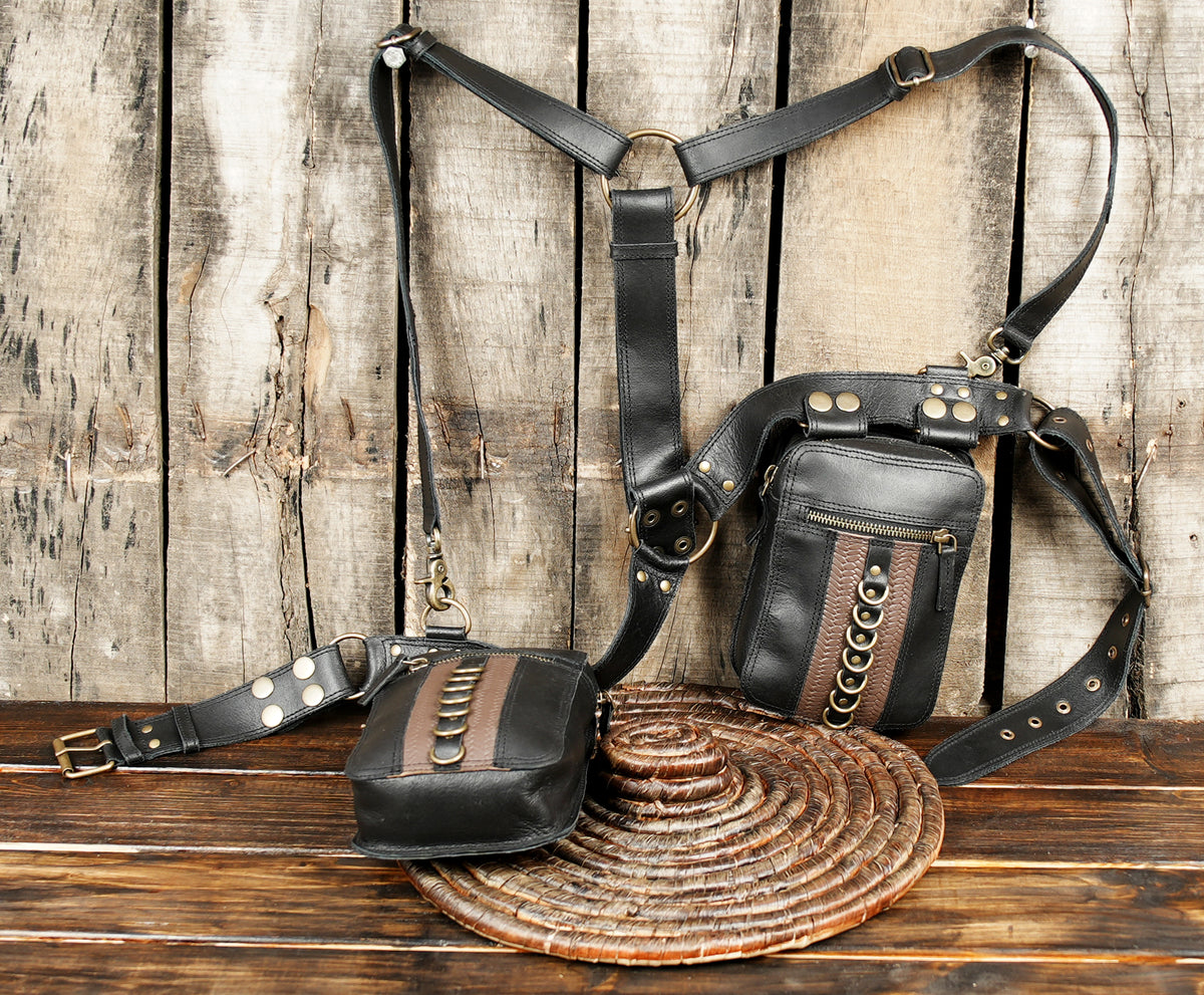 Adjustable black leather chest harness featuring dual detachable side pockets   