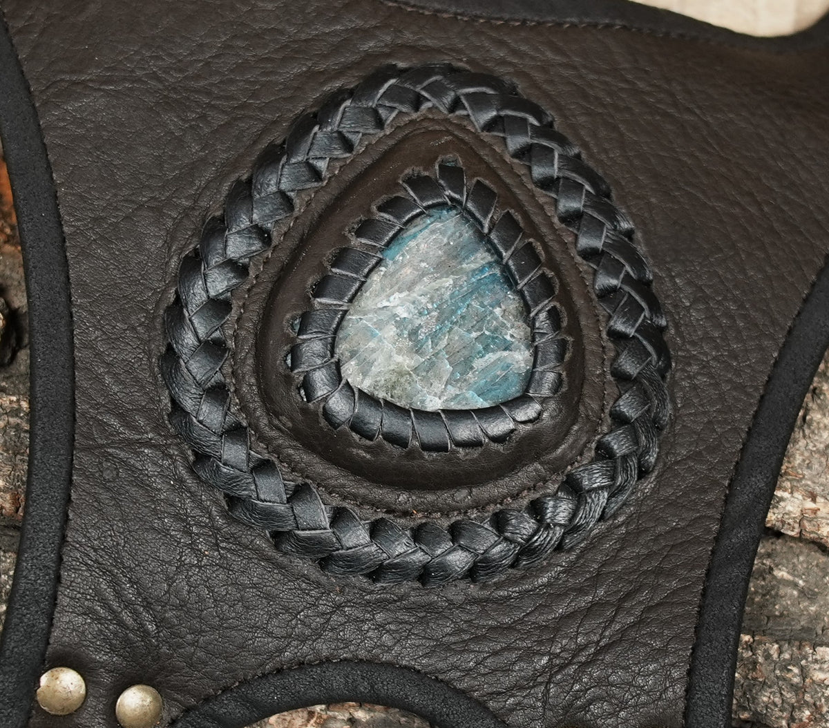 Gothic festival accessory featuring a double leather holster and turquoise stone detail