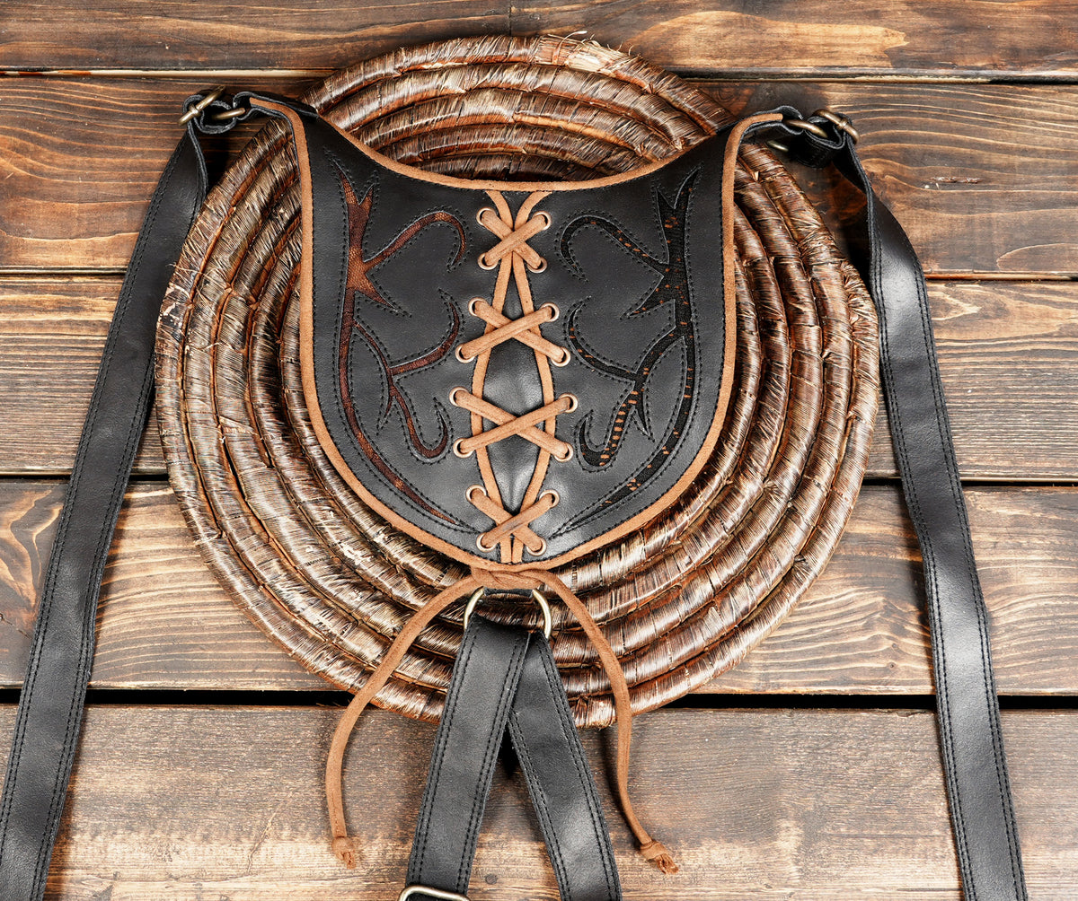 Handmade leather harness bag with multiple utility pockets