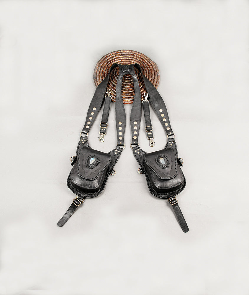 Handmade black leather festival harness bag with two front pouches and adjustable shoulder straps
 