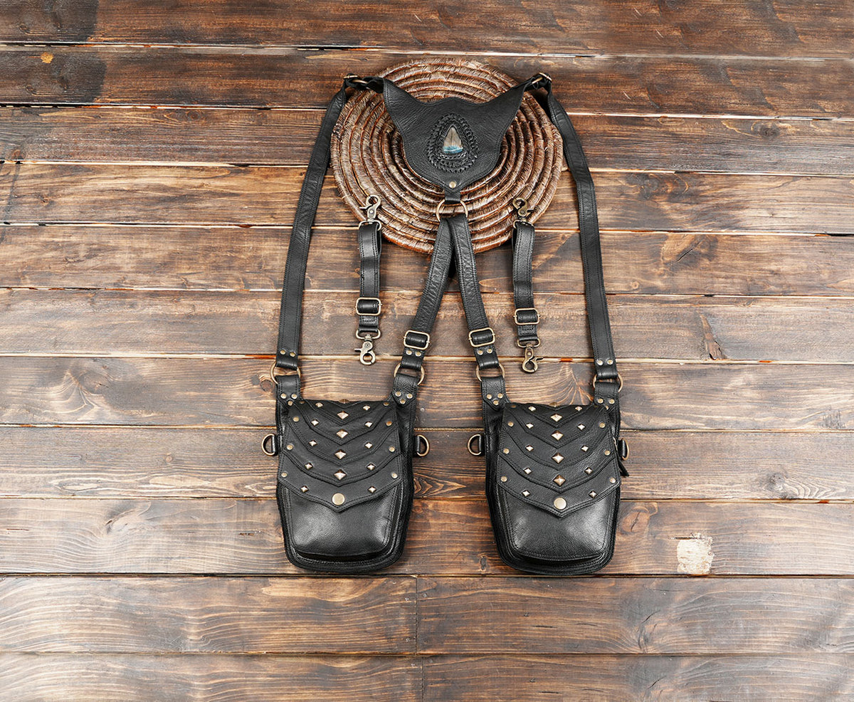 Black leather double pouch shoulder holster with studded gothic design and adjustable straps