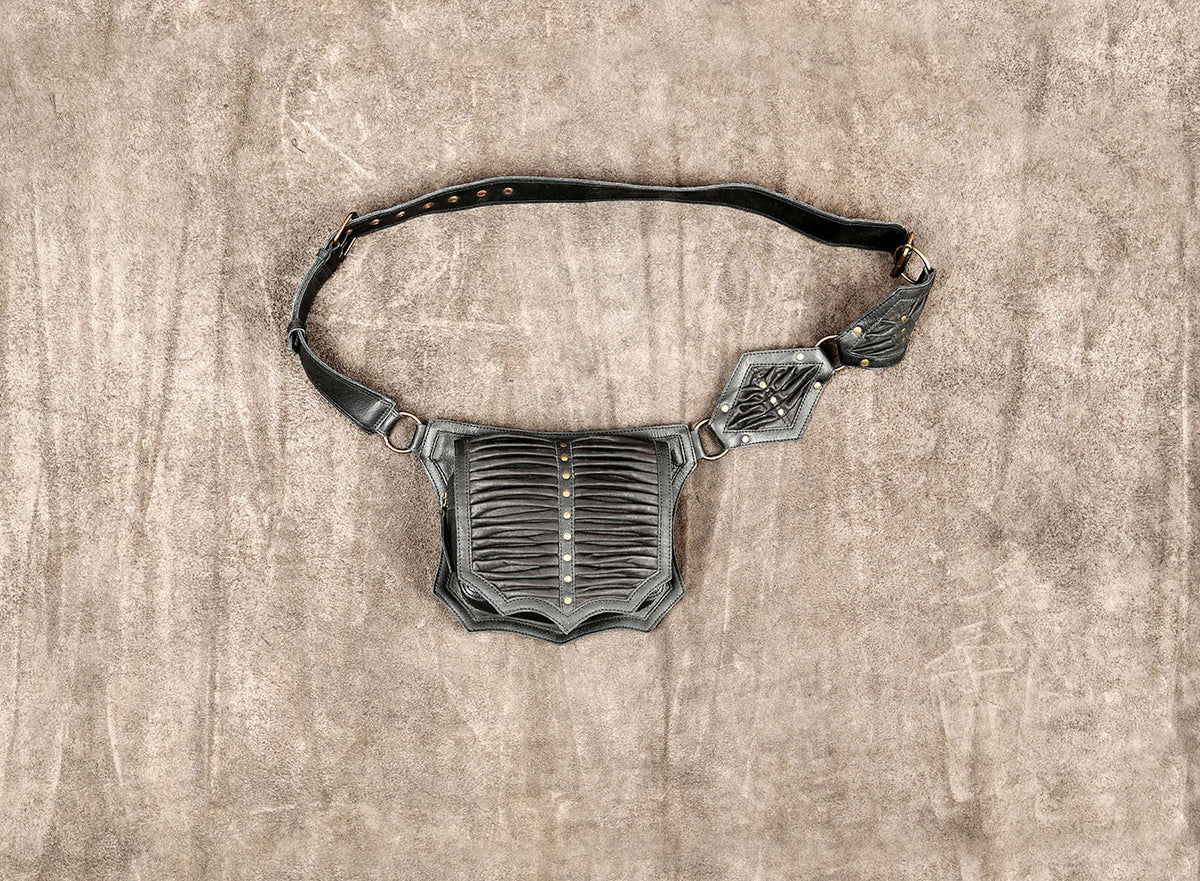 Leather holster bag for festivals with ruched design and brass studs