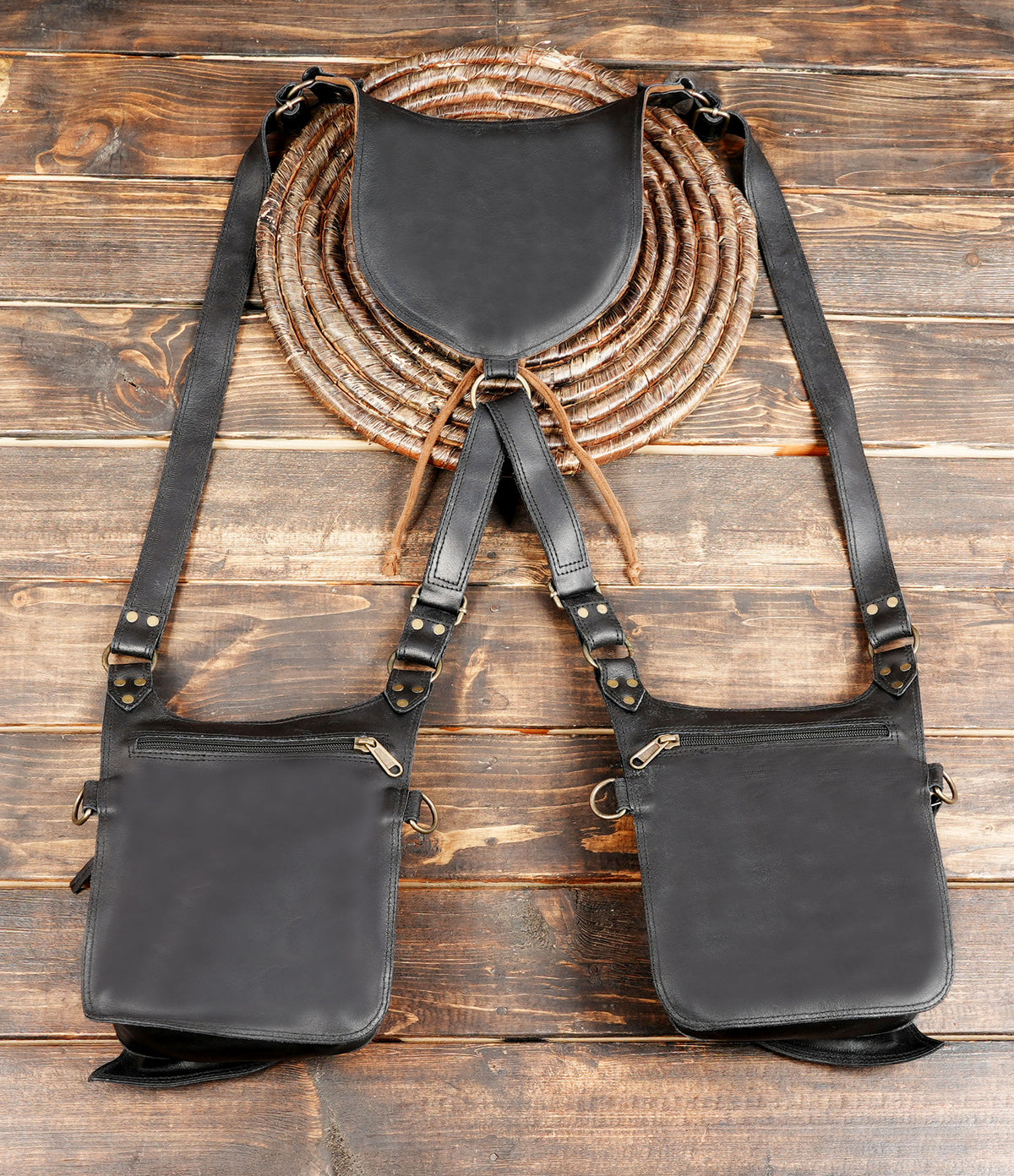 Black leather crossbody harness bag with multiple compartments