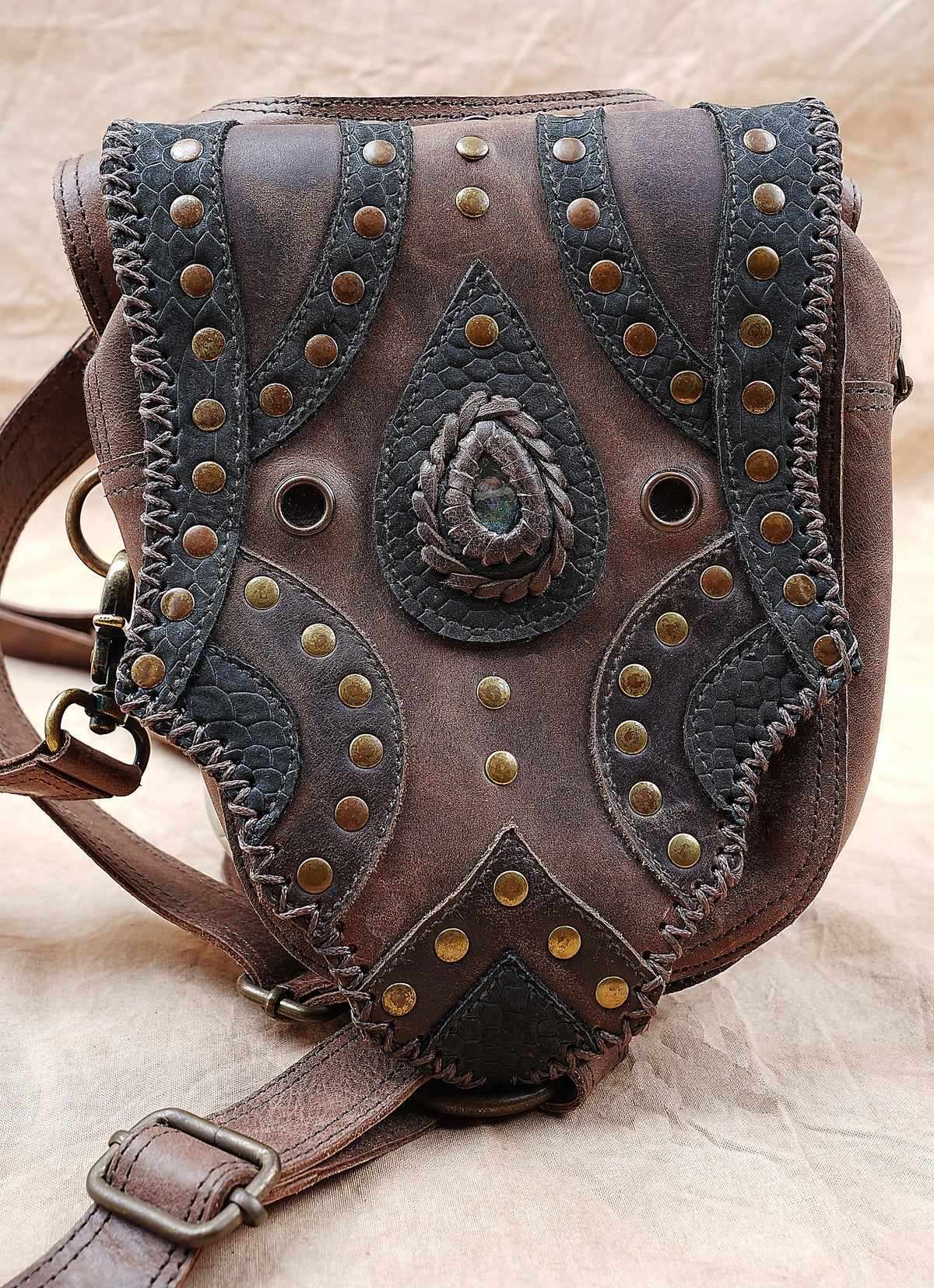 Unisex brown leather utility belt bag with two pouches and adjustable shoulder straps