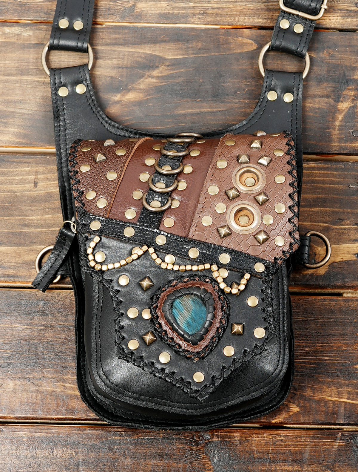 Boho leather double pouch belt bag with turquoise stone accents and intricate hand stitching