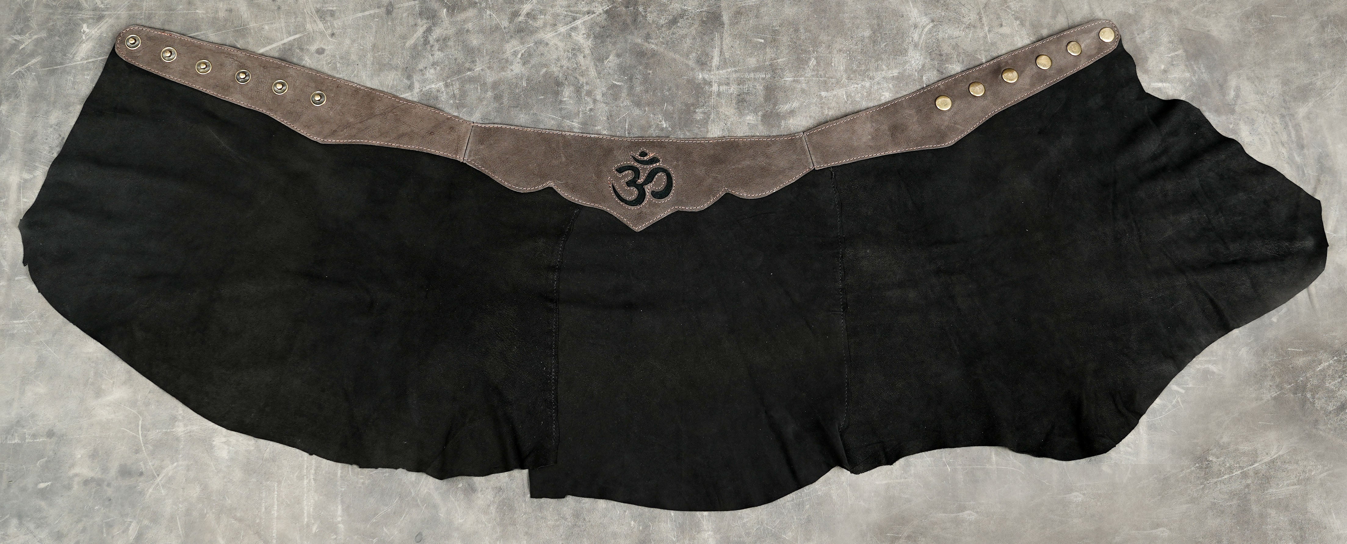 Boho flowy leather skirt in black, flat lay view