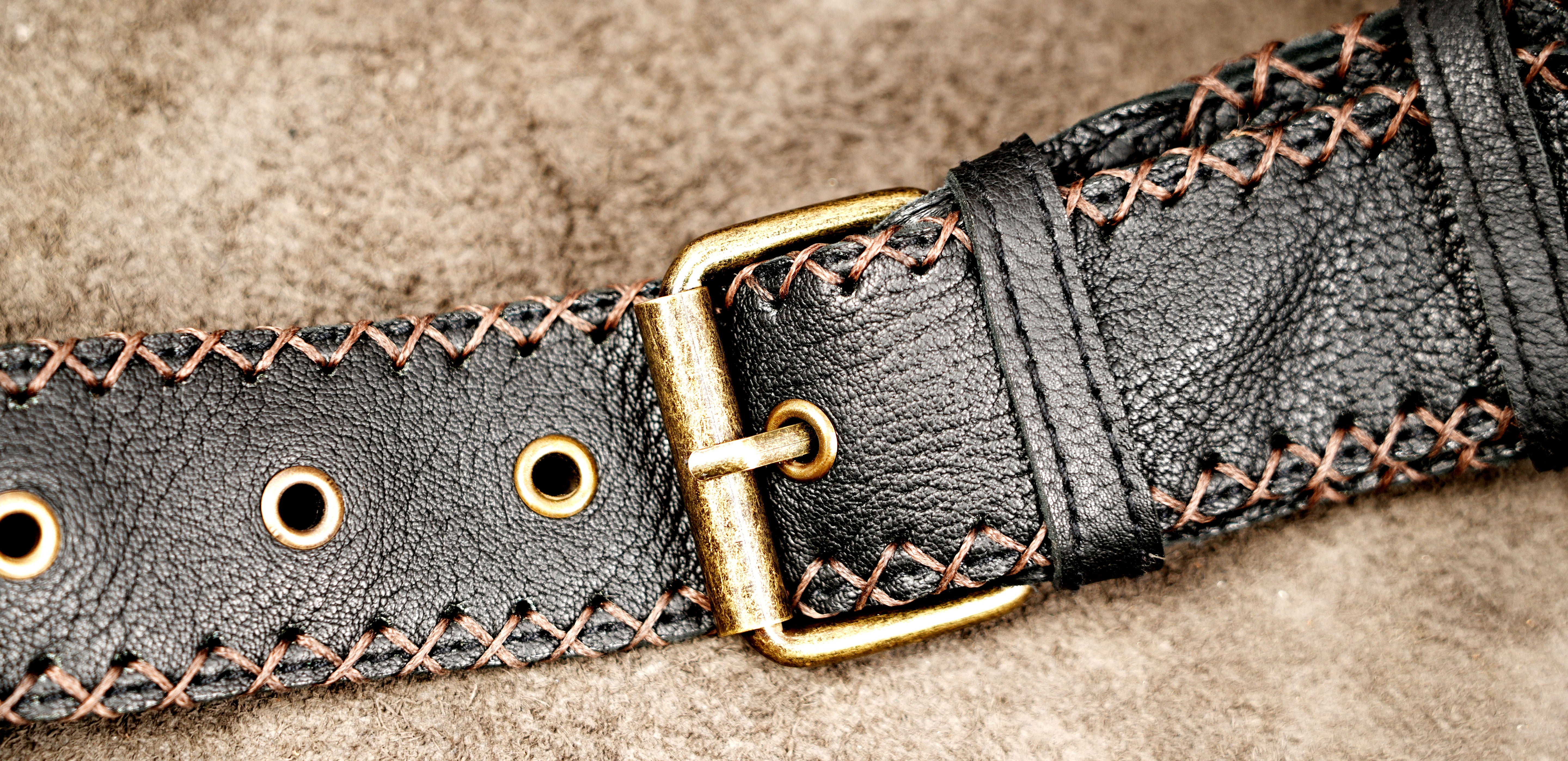 Boho leather fanny pack with braided accent and patchwork design