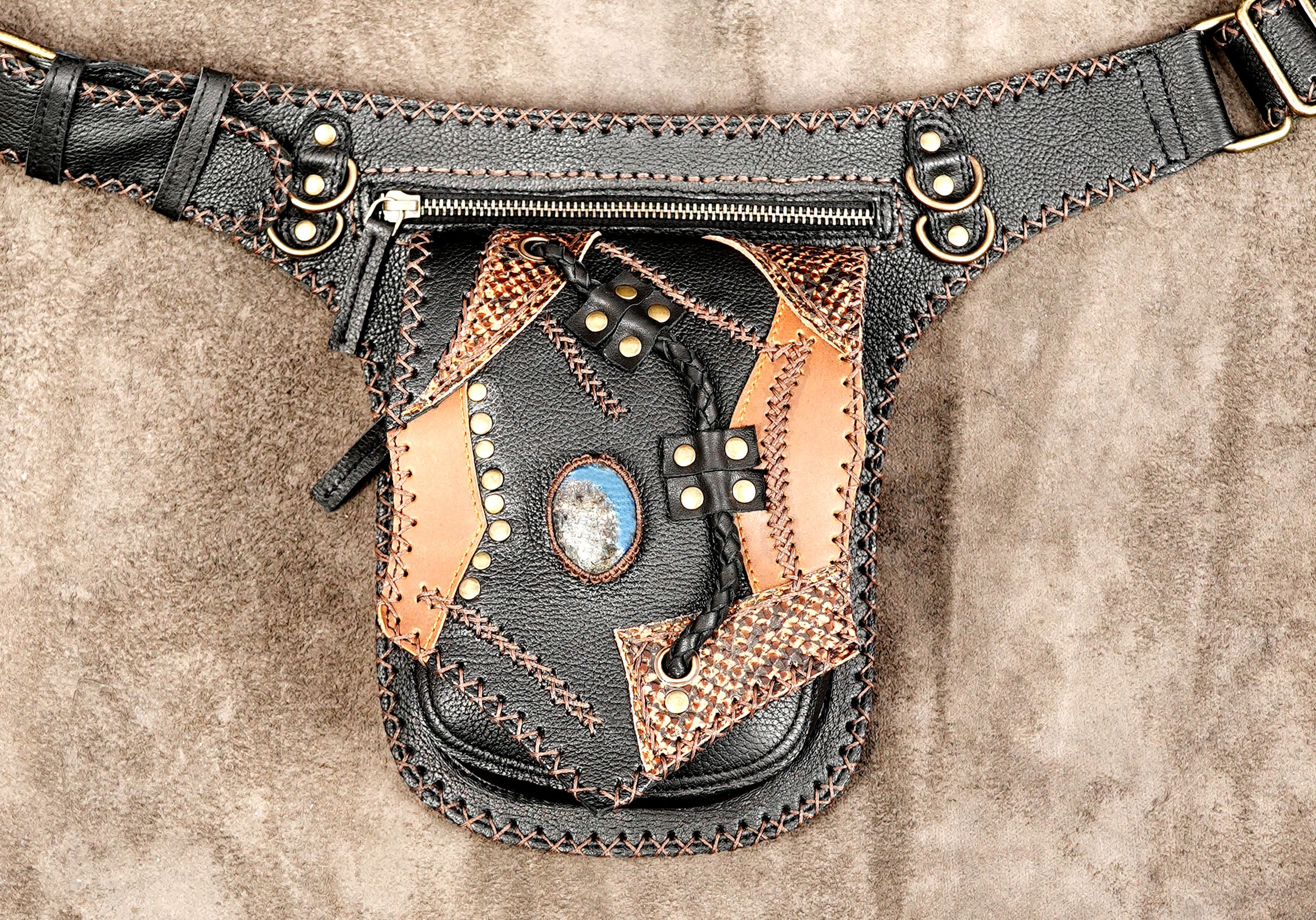 Boho patchwork leather belt bag with tribal stitching and studs