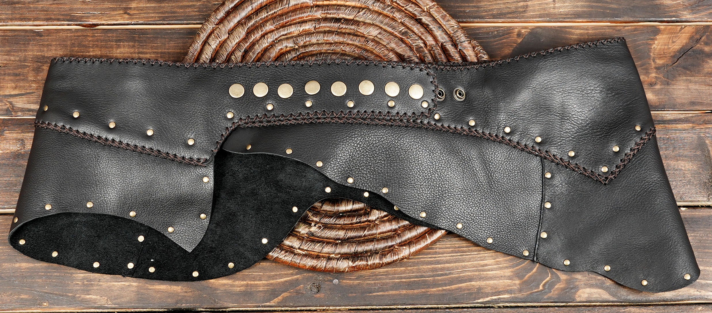 Boho punk leather skirt with riveted panel detail