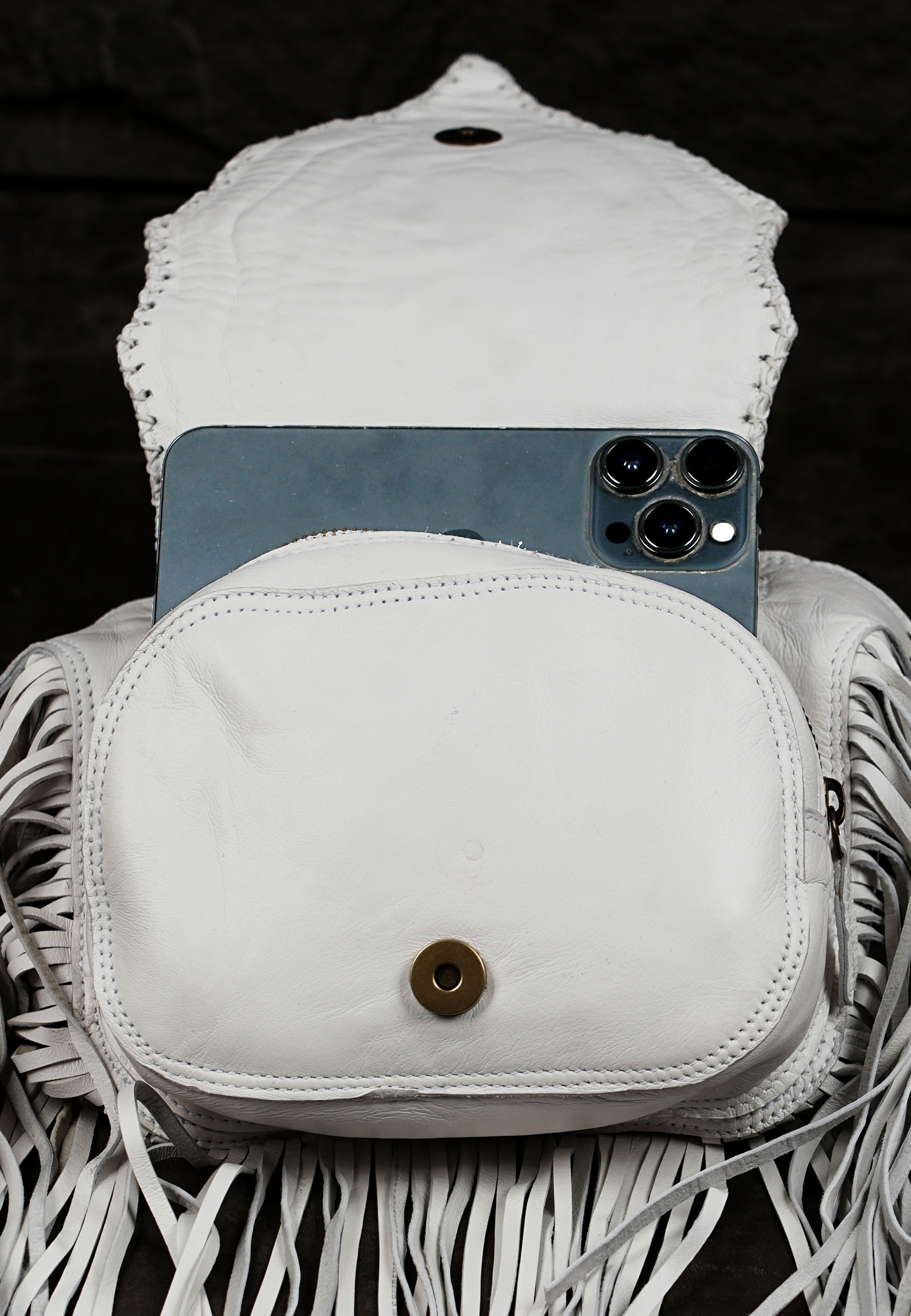 Boho white waist pouch with hand-stitched leather design