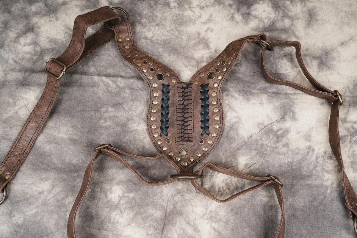 Steampunk leather double pocket bag with decorative stitching and gemstone details