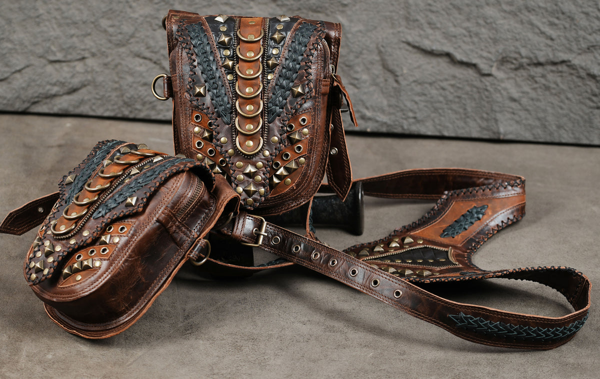 Gothic leather shoulder harness with matching double pouches and intricate black detailing