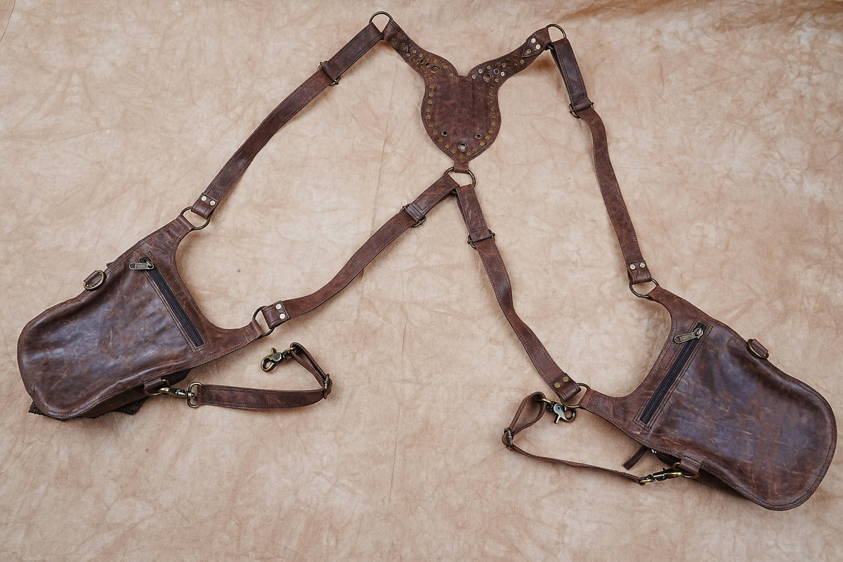 Bohemian brown leather harness pouch with black accents and ornate stitching