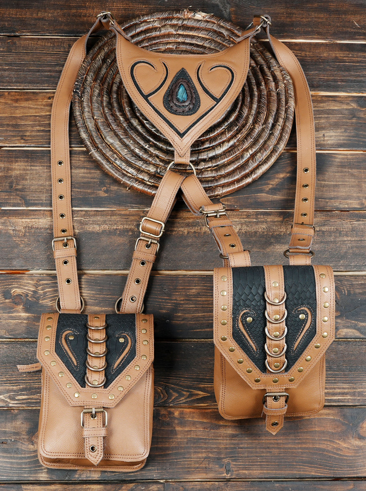 Tan leather festival harness bag with heart shaped gemstone centerpiece