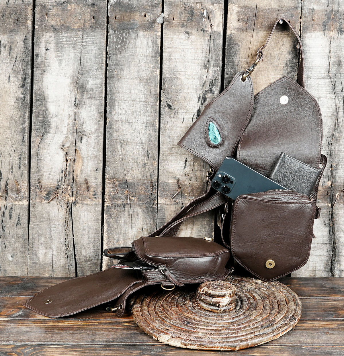 Artisan leather festival bag set with antique brass clips and zipper pockets
