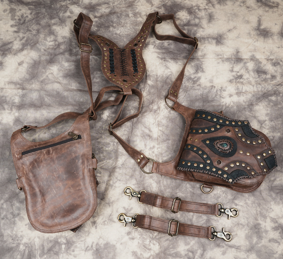 Unisex steampunk shoulder harness with matching leather pockets and adjustable buckle straps.