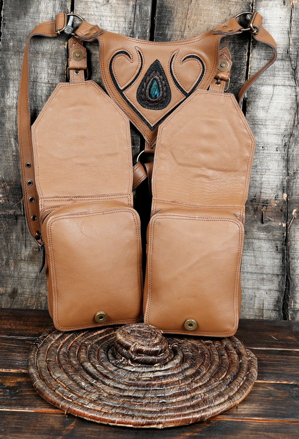 Leather festival accessory with twin utility pouches and metal hardware