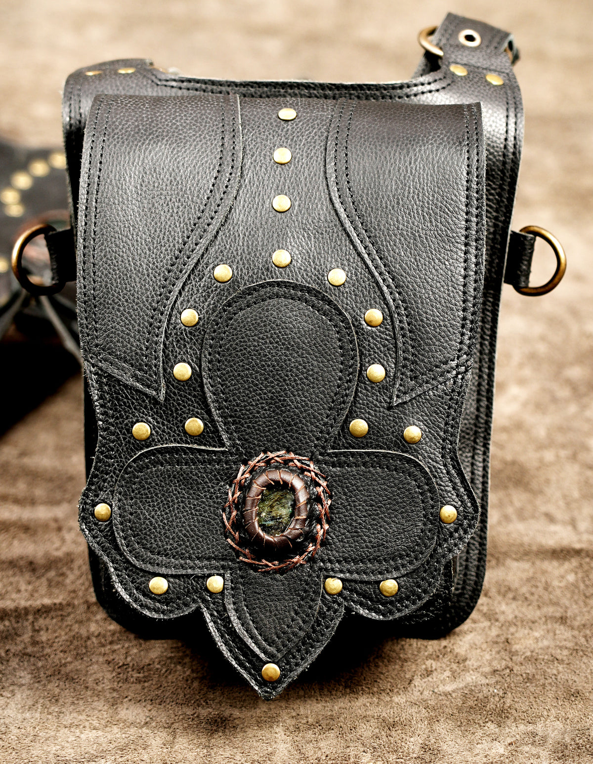 Black leather utility pouch harness with antique brass metal fittings