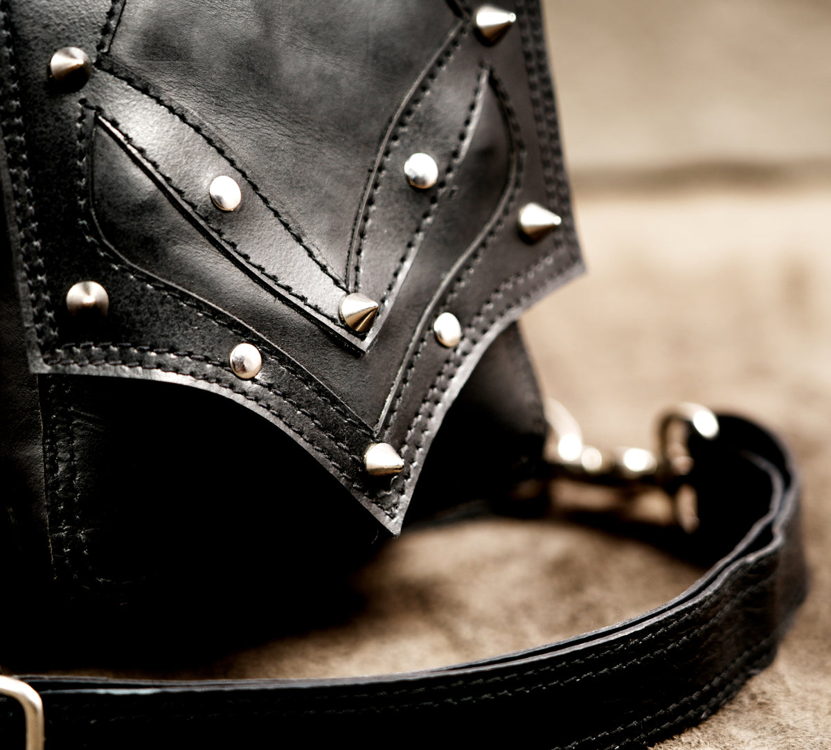 Convertible leather thigh bag with detachable leg strap