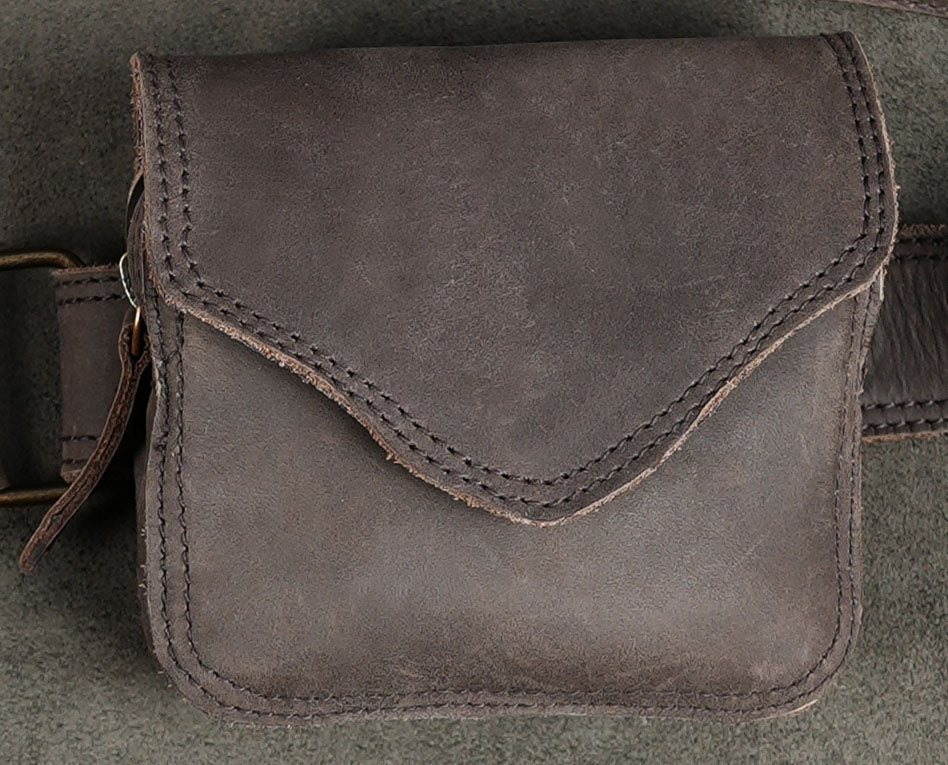 Convertible leather thigh bag with leg strap and side pouch