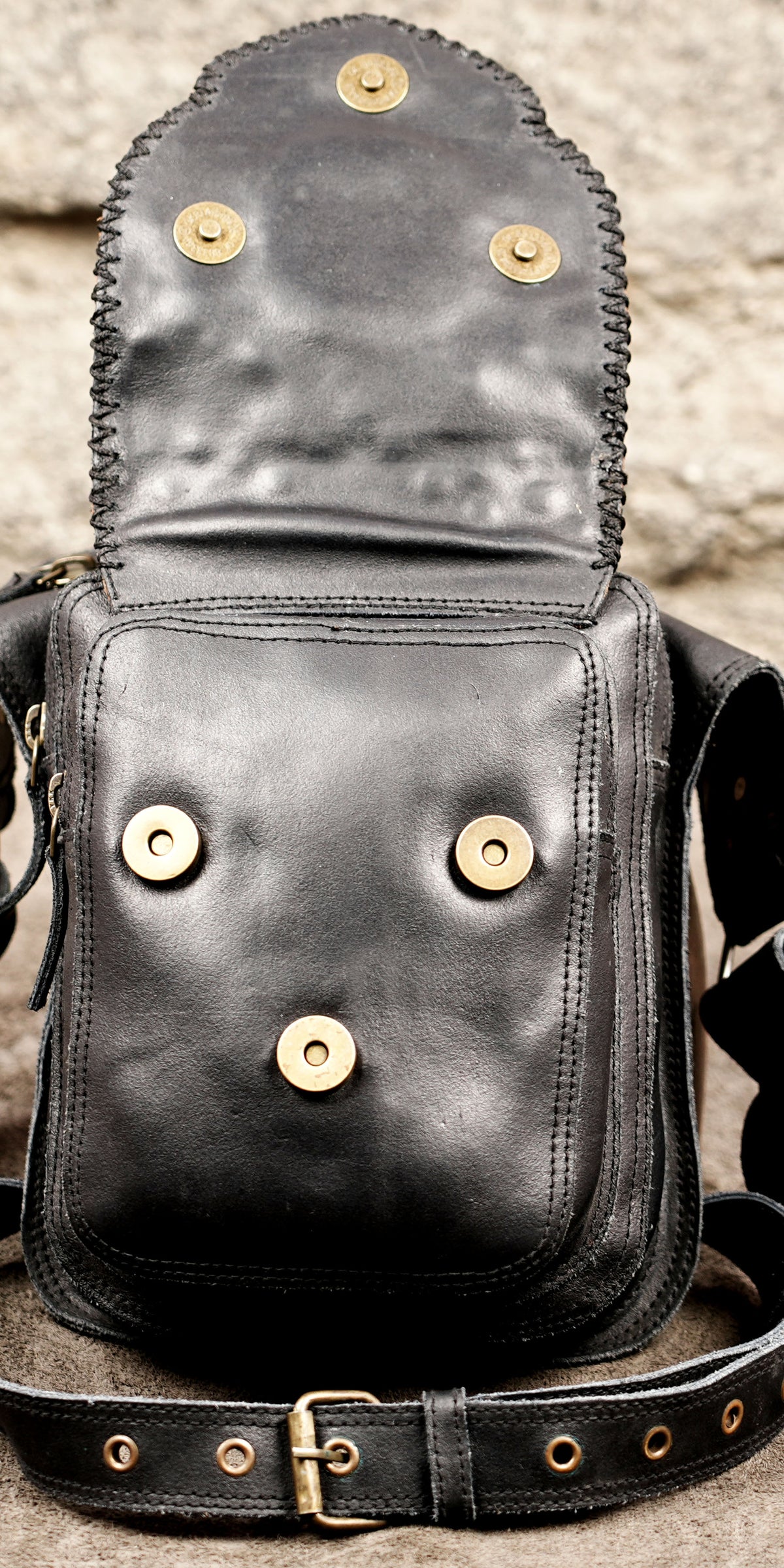 Convertible leather thigh holster with adjustable leg strap