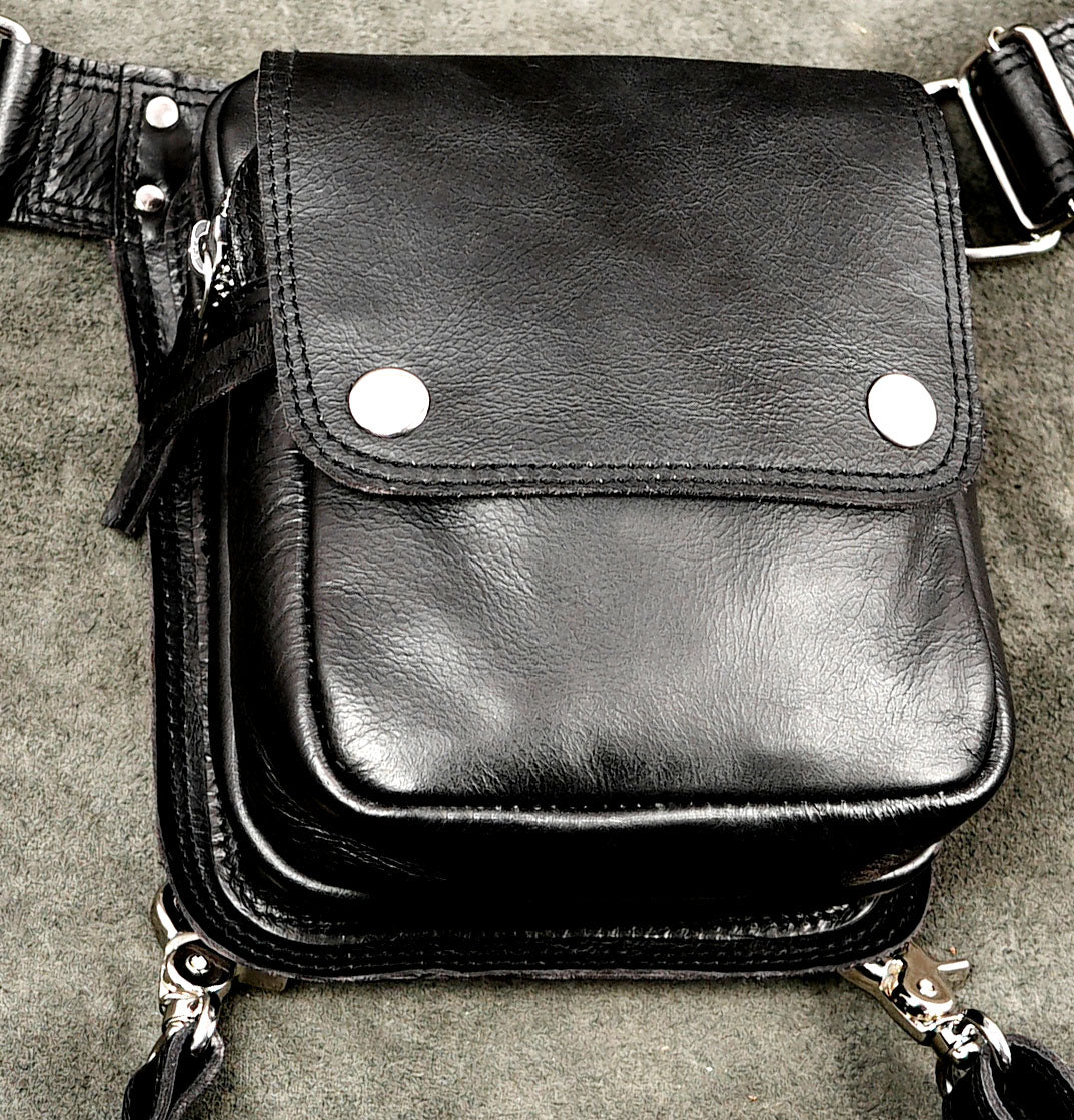 Convertible leather thigh bag with detachable leg strap