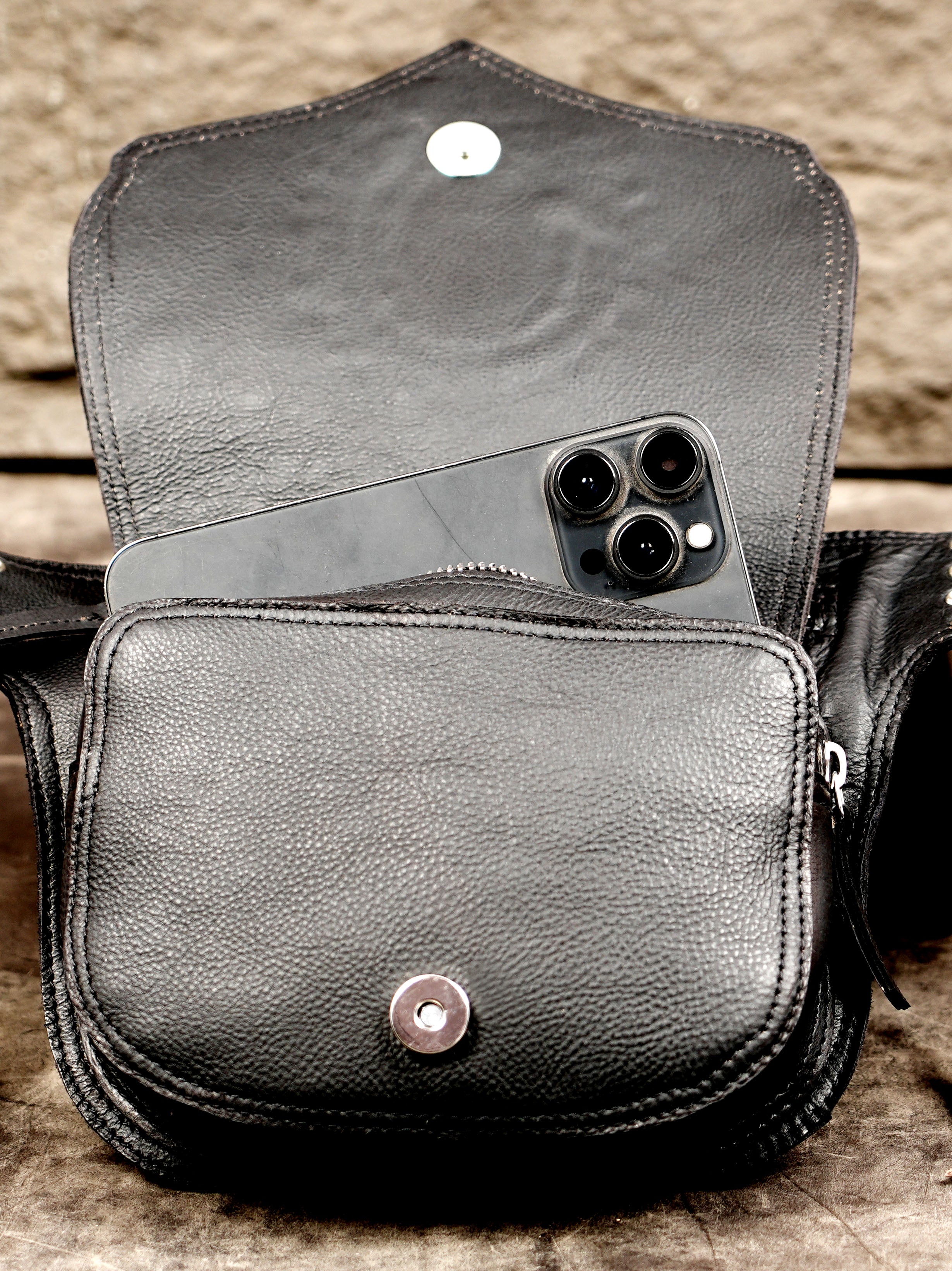 Crystal centered leather pouch, corset lace close up