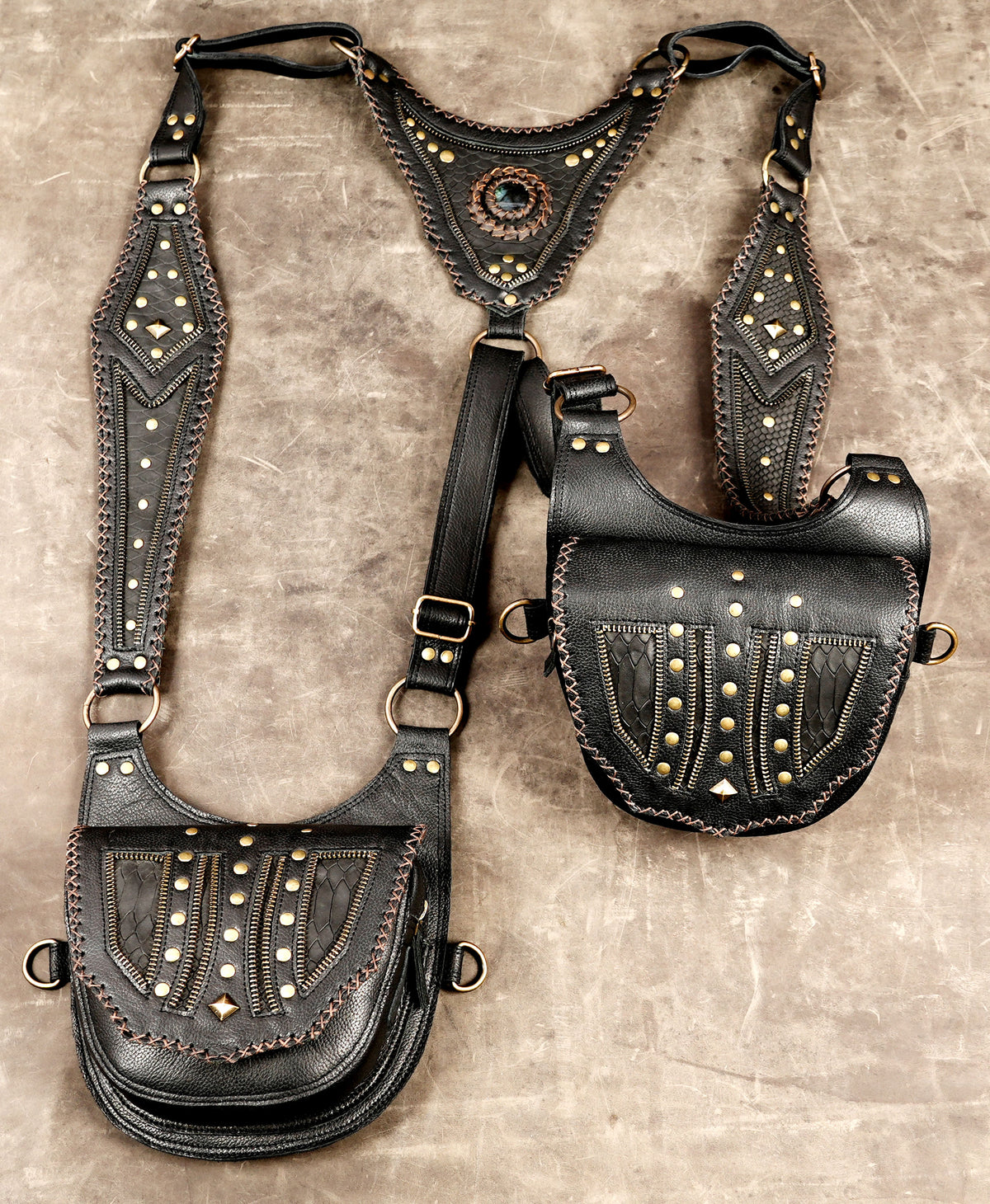 Unisex gothic leather bag harness with matching pouches and metal hardware