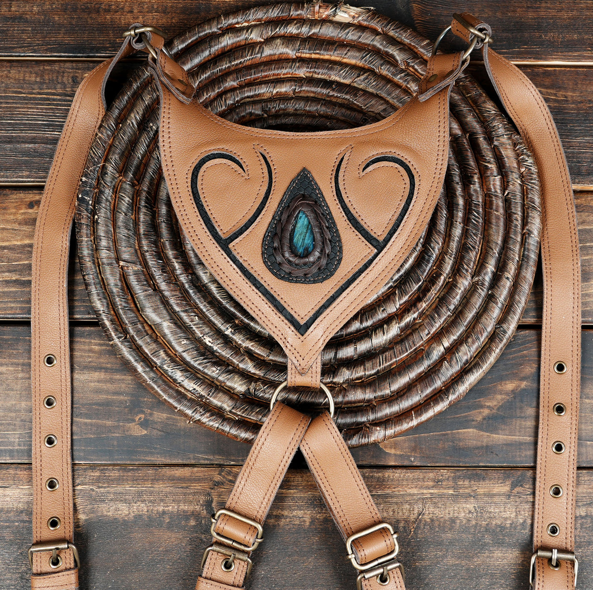 Tan leather steampunk shoulder harness with metal studs and buckles