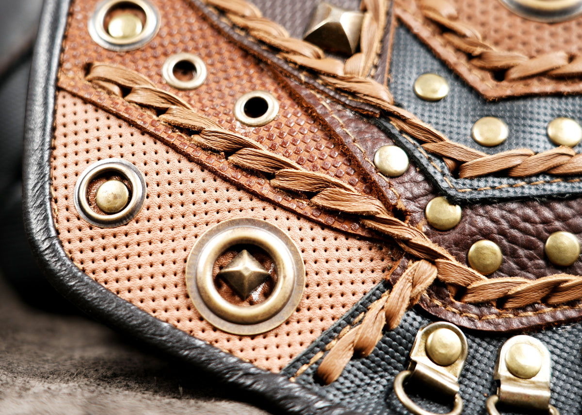 Handcrafted steampunk holster bag with studded leather side pockets