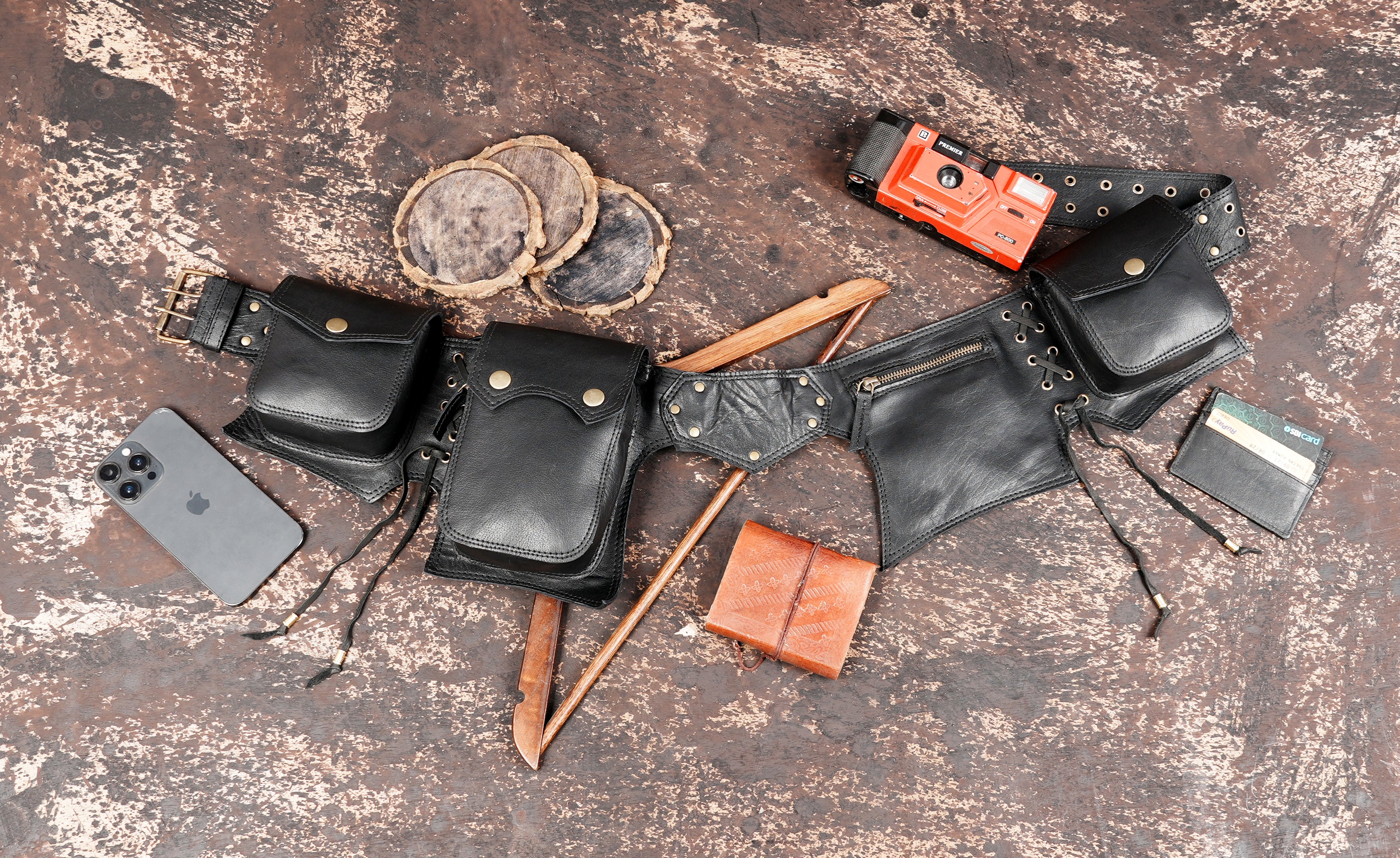 Multi-compartment leather belt with antique rivet accents