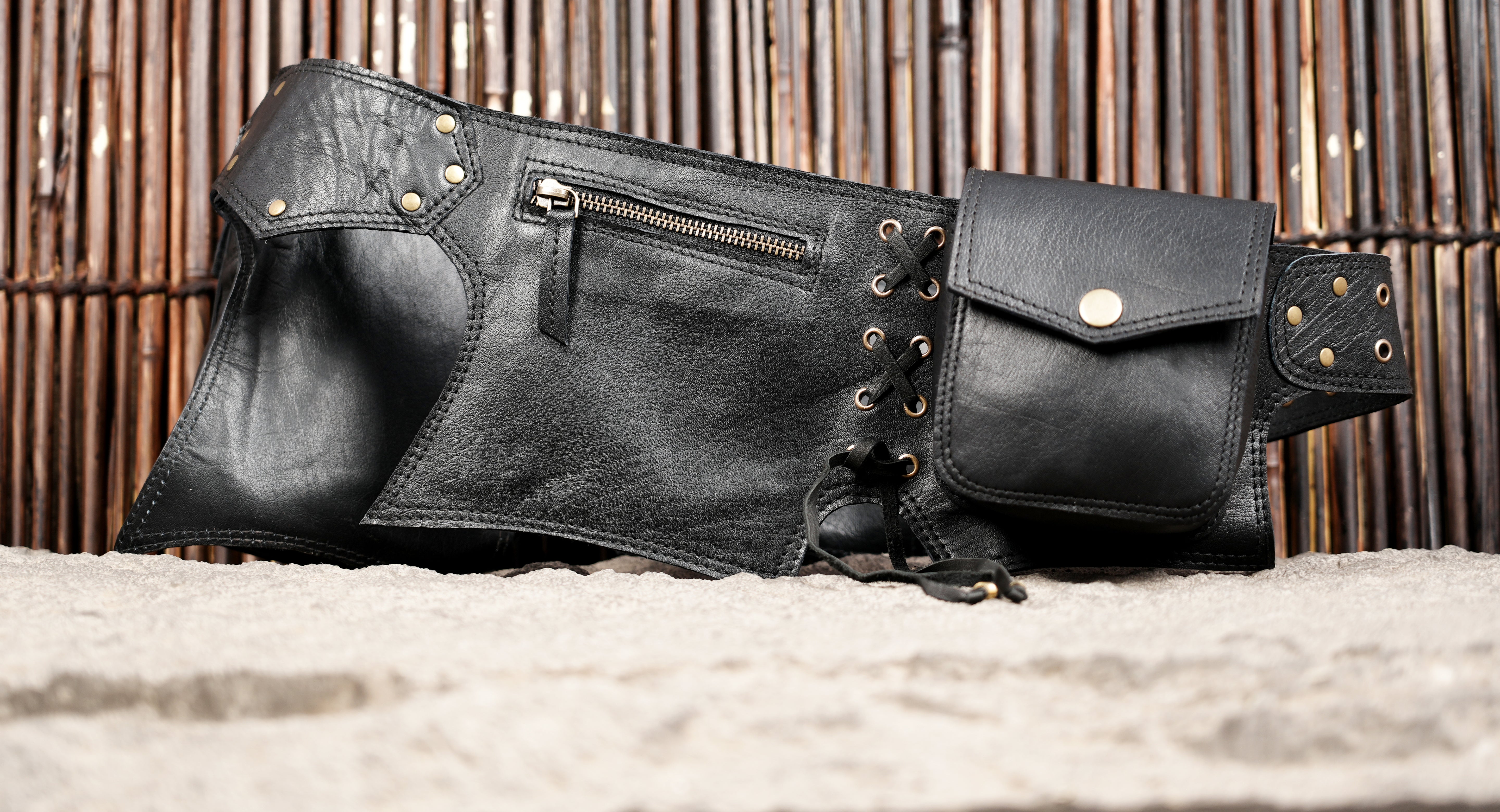 Festival-ready leather waist belt with multiple pouches